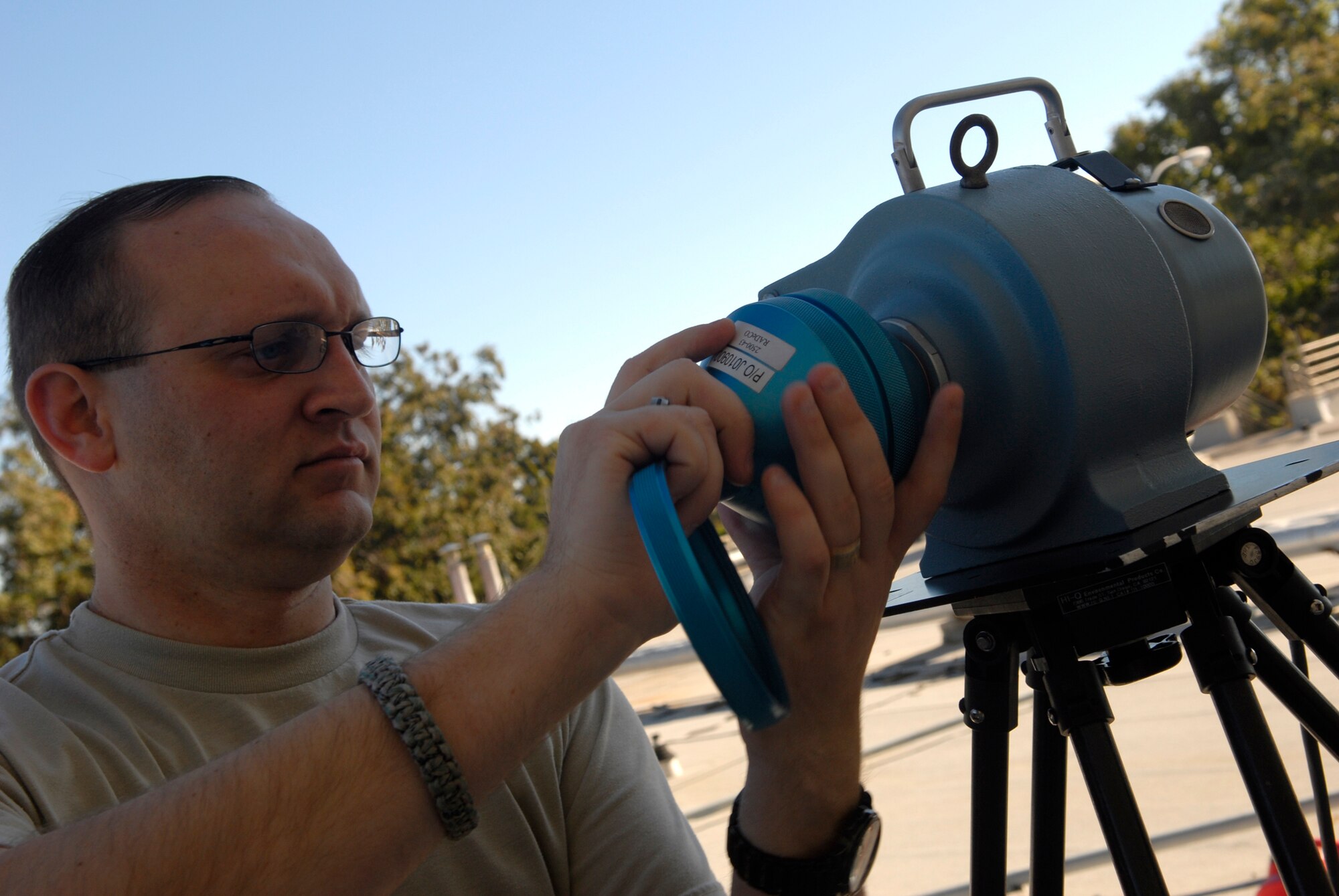 VANDENBERG AIR FORCE BASE, Calif. -- Tech. Sgt. Ryan Fictum, a bioenvironmental technician with the 30th Medical Operations Squadron, sets up and calibrates a radeco high volume air sampler on Jan. 9. The sampler captures concentrations of radiation in the air on a filter. (U.S. Air Force photo/Senior Airman Christian Thomas)