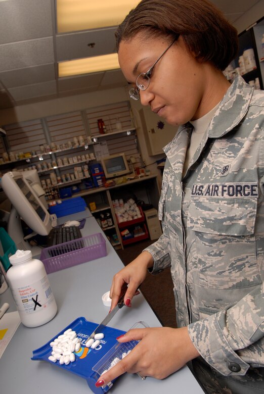 VANDENBERG AIR FORCE BASE, Calif. -- Airman 1st Class Chanel Little, a pharmacy technician with the 30th Medical Support Squadron, counts pills before they are given to a patient on Jan. 9. (U.S. Air Force photo/Senior Airman Christian Thomas)