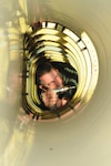 Mike Booth, Lear Siegler Inc. contractor, installs the air intake liner inside the engine of a T-38 at the Queen Bee facility at Randolph Air Force Base, TX. Queen Bee is the only heavy maintenance provider for the T-38 fleet, providing support of T-38 inspection, maintenance and modification requirments continuously for more than 30 years. (US Air Force photo Rich McFadden) 