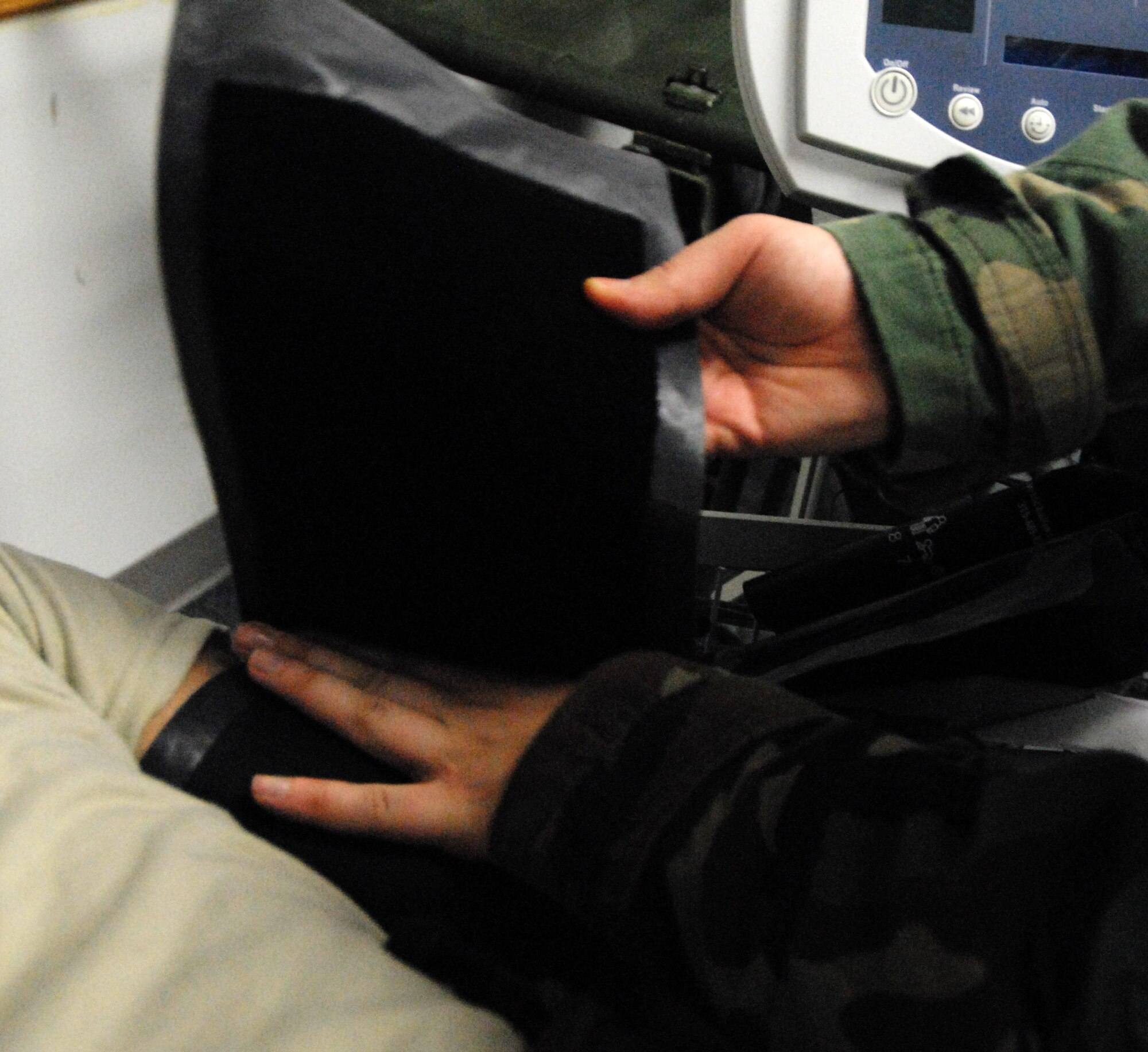 Airman 1st Class Sarah Hudak, 8th Medical Group, checks the vital signs of a patient during the Peninsula-Wide Operational Readiness Exercise at Kunsan Air Base, Republic of Korea, Jan. 14, 2009. The patient was brought in after experiencing shortness of breath. (U.S. Air Force Photo by Senior Airman Gustavo Gonzalez) 