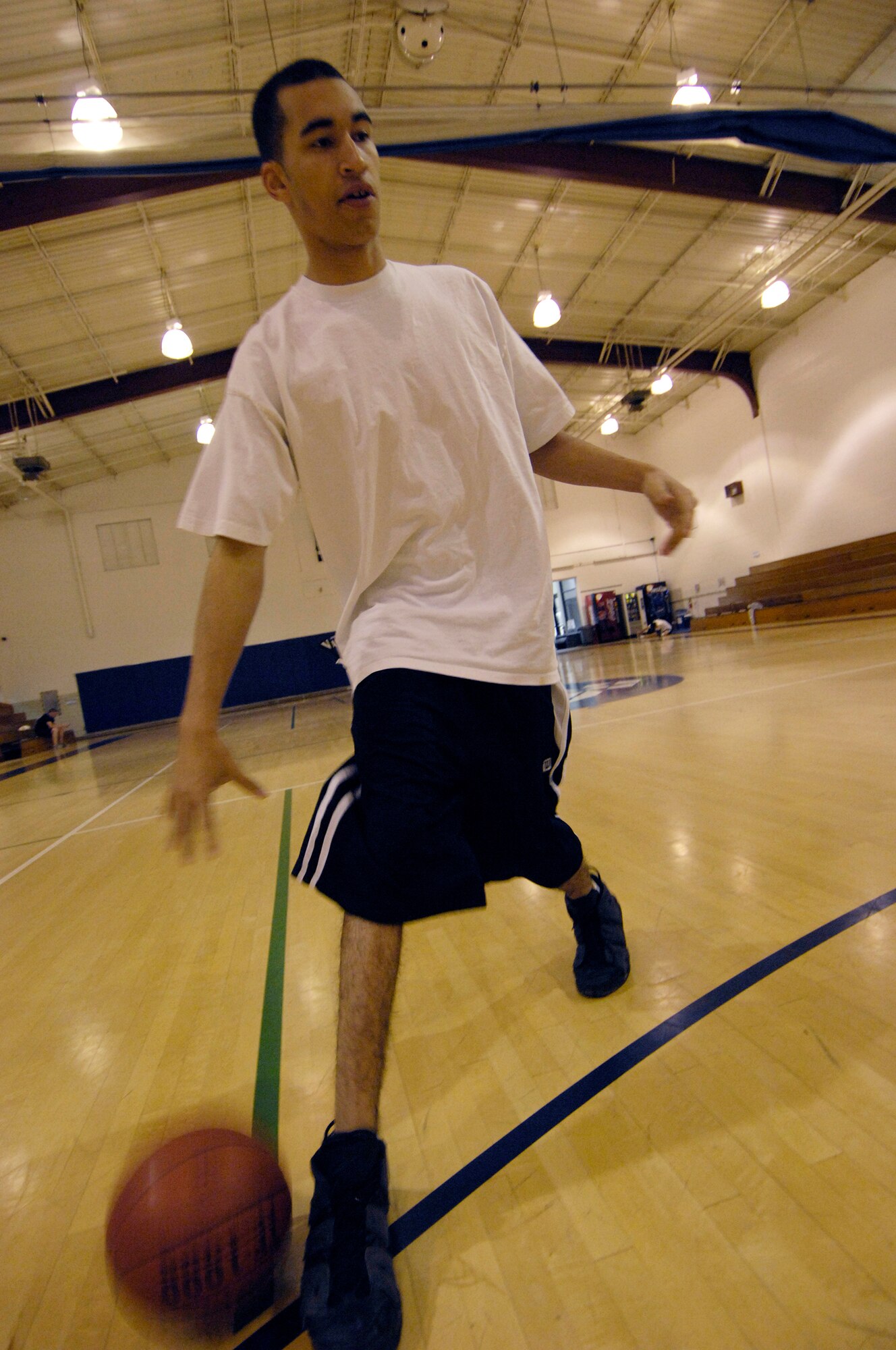 VANDENBERG AIR FORCE BASE, Calif. --  Shoe grip is Important. Basketball shoes that are old and flat on the bottom can have very little grip on the court. Playing basketball is a very difficult task when your feet are sliding around on the court, but there are steps you can take to improve your shoe grip; Such as wiping the bottoms of your basketball shoes before each game. (U.S. Air Force photo/Senior Airman Matthew Plew)