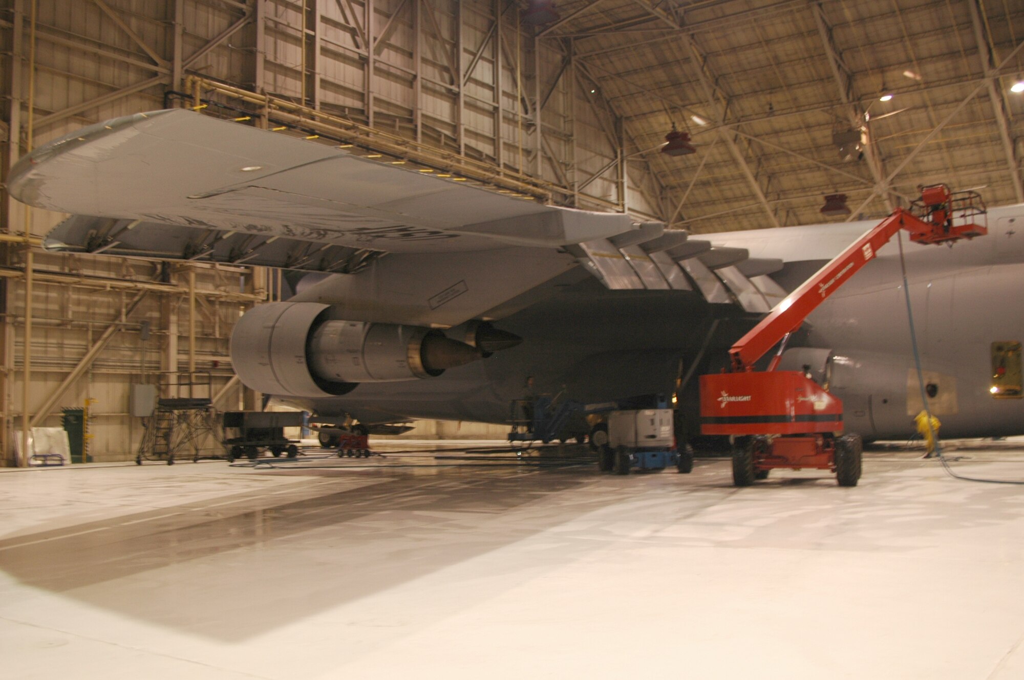A C-5 Galaxy from Wright-Patterson Air Force base flew here to be cleaned, Jan. 12.The Starlight Corporation, a defense contractor based out of Hawaii, detailed the aircraft inside and out. Servicing the aircraft prevents corrosion and provides a clean product for flight line mechanics to inspect (U.S. Air Force photo/Senior Airman Andria J. Allmond).