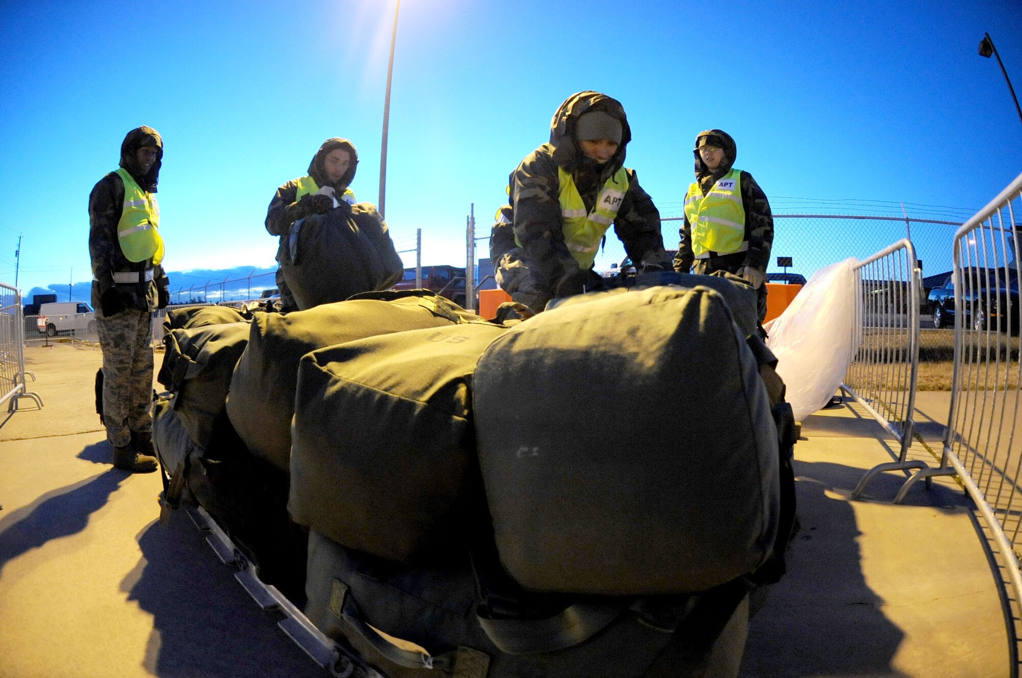 DYESS AIR FORCE BASE, Texas -- 7th Bomb Wing members palletize mobility bags of deploying personnel during the operational readiness inspection here, Jan. 6. Bags are palletized for safe transportation on military aircraft.  (U.S. Air Force photo by Senior Airman Domonique Simmons)