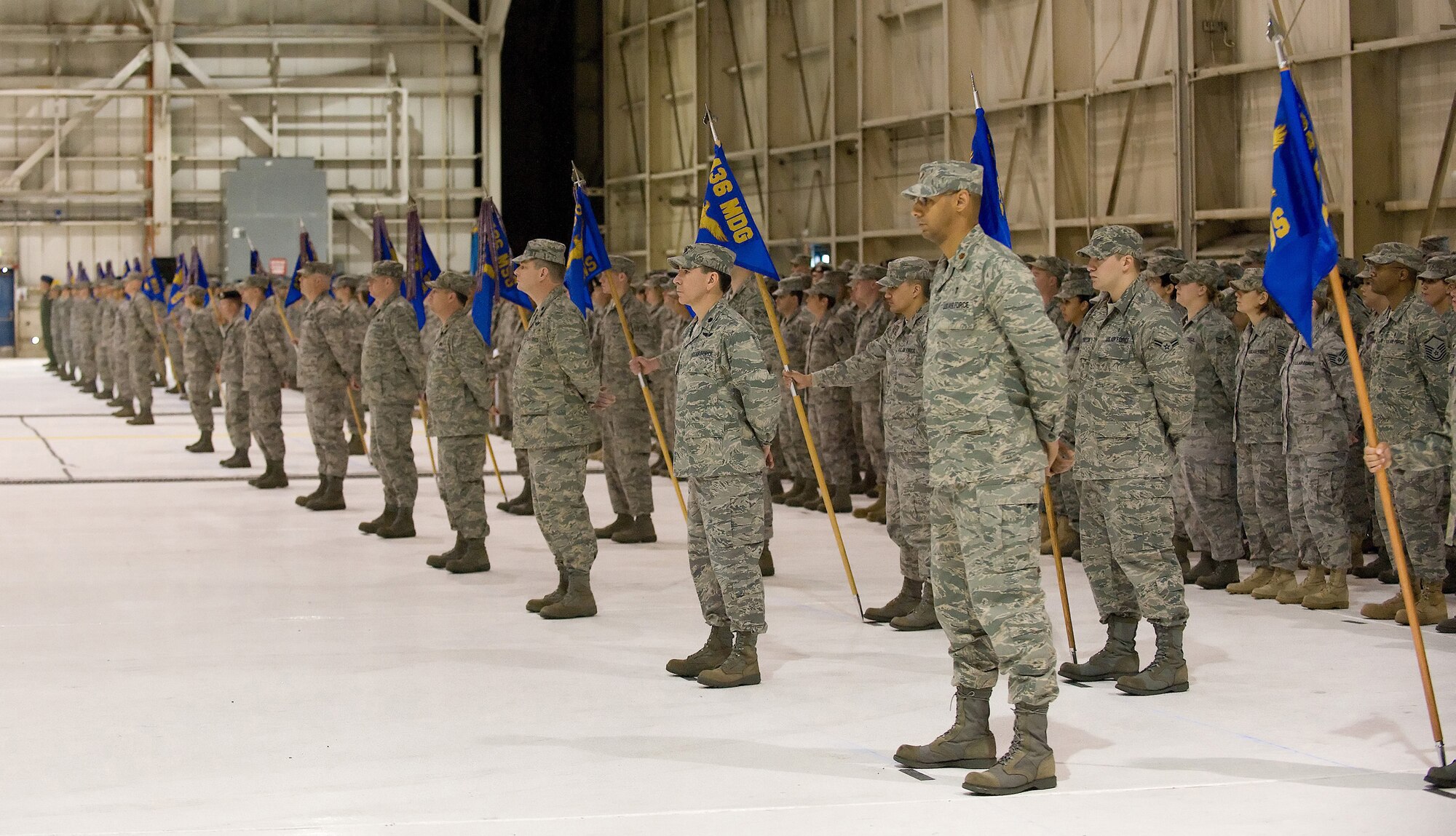 Members of the 436th Airlift Wing stand in formation during the change-of-command ceremony Jan. 9. Col. Manson O. Morris assumed command of the Eagle Wing from Col. Steven B. Harrison. (U.S. Air Force Photo/Jason Minto)