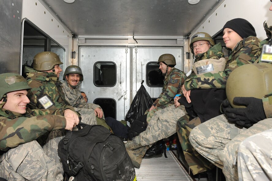 DYESS AIR FORCE BASE, Texas -- A group of 7th Aircraft Maintenance Airmen settle in the back of a maintenance truck awaiting orders to work on a B-1B Lancer during the operational readiness inspection (ORI) here, Jan 6.  These maintenance Airmen are vital in arming and preparing aircraft for combat missions.  (Air Force photo by Staff Sgt. Connor Estes) 