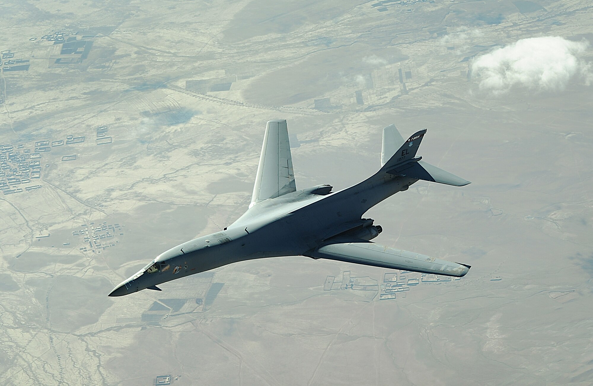 A B-1B Lancer flies a combat patrol mission over Afghanistan recently.  B-1Bs fly close-air-support missions for both Operation Enduring Freedom and Operation Iraqi Freedom. The B-1B is assigned to the 34th Expeditionary Squadron. (U.S. Air Force photo/Staff Sgt. Aaron Allmon)  