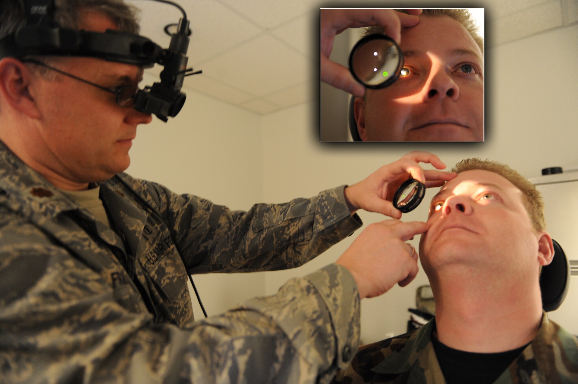 WHITEMAN AIR FORCE BASE, Mo. - Maj. Doug Franz, 509th Medical Operations Squadron optometrist, uses a binocular in-direct ophthalmoscope to look into a patient’s retina for eye disease Jan. 12. Dr. Franz wears the device on his head which aligns a microscope in front of his eyes allowing him to look into the lens he holds over the patients’ eye and direct light into the retina. The optometry clinic serves active duty and dependents and is open Monday – Thursday from 7:30 a.m. – 4:30 p.m. and Friday from 8:30 a.m. – 4:30 p.m. Appointments can be made by calling 687-2188. (U.S. Air Force illustration/Airman 1st Class Carlin Leslie) 