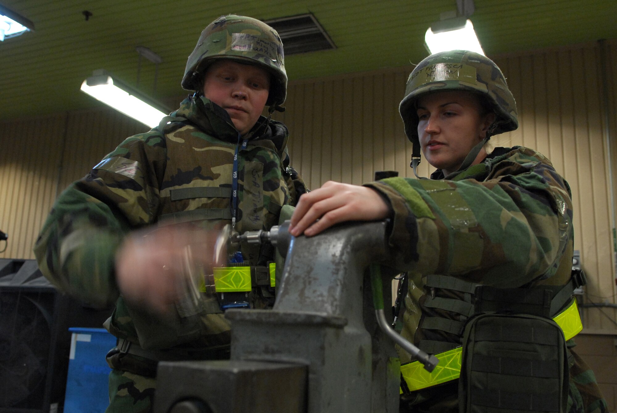 Senior Airman Timothy King and Staff Sgt. Francesca Wilson, put together a dynatube fitting used to fix aircraft hydraulics during Exercise Beverly Bulldog 09-01 Jan. 13. The 51st Fighter Wing is currently undergoing a week-long Operational Readiness Exercise to test its ability to conduct war time missions. Sergeant Wilson and Airman King are both assigned to the 51st Maintenance Squadron.  (U.S. Air Force photo/Senior Airman Christopher Boitz)