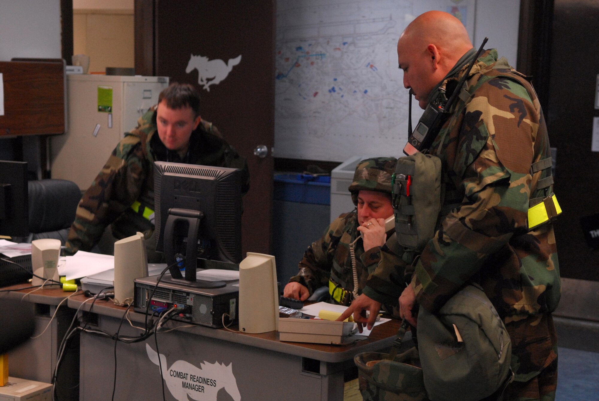 Master Sgt. Richard Chavez attempts to assume control of the 51st Maintenance Squadron’s unit control center during Operational Readiness Exercise Beverly Bulldog 09-01 at Osan AB Jan. 13. The 51st Fighter Wing is currently undergoing a week-long Operational Readiness Exercise to test its ability to conduct war time missions.  Sergeant Chavez is assigned to the 51 MXS. (U.S. Air Force photo by Senior Airman Christopher Boitz)