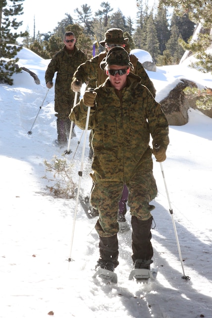 Navy Lt. Bill Vaughan, a mountain medicine medical officer at the Marine Corps Mountain Warfare Training Center Bridgeport, Calif., leads his team, team one, through the Mountain Leaders Course snow shoe familiarization exercise at the Grouse Meadows training area Jan. 15.