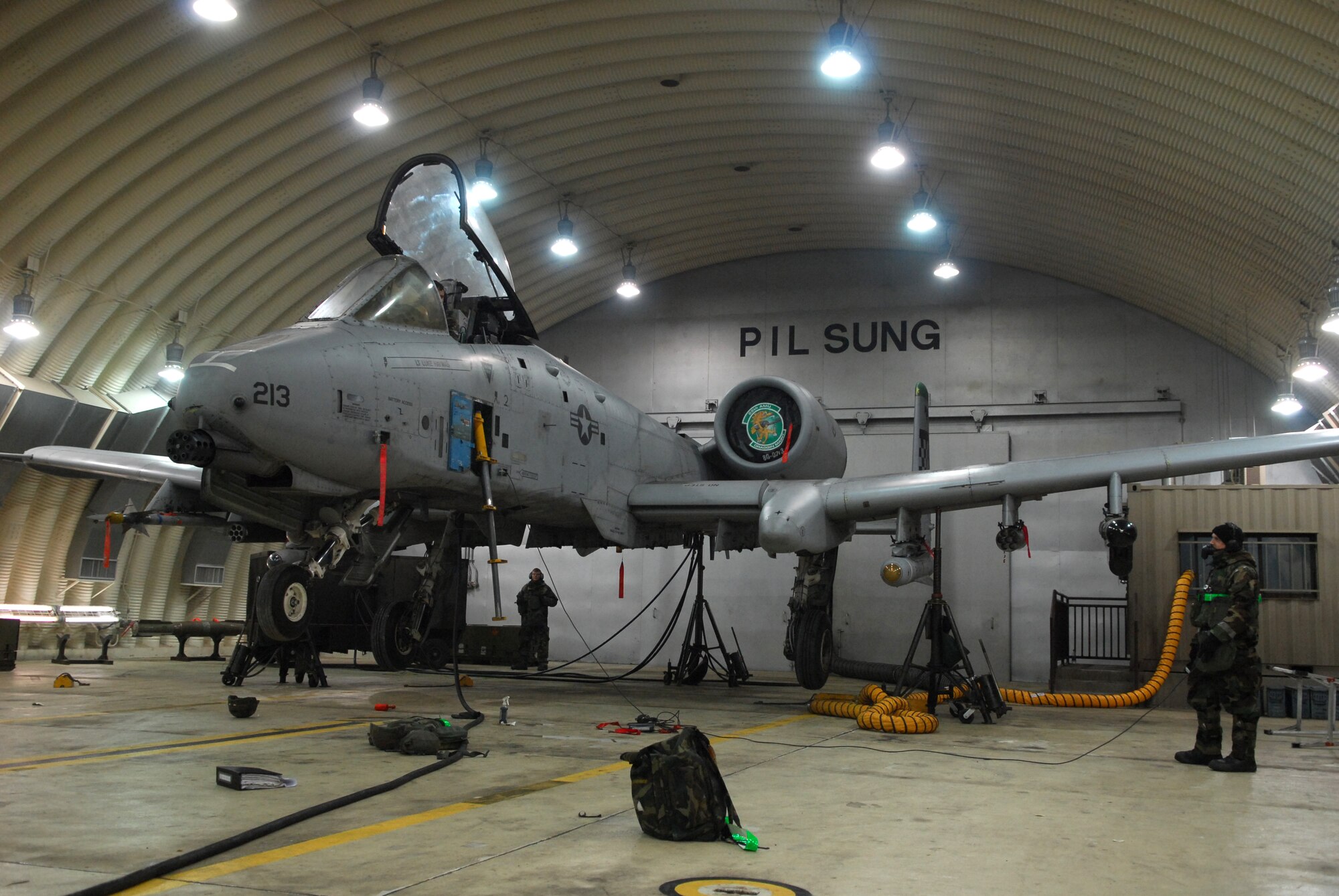 Airmen  assigned to the 25th Aircraft Maintenance Unit perform testing of an A-10 Thunderbolt II landing gear during Exercise Beverly Bulldog 09-01 Jan. 15 at Osan AB. The 51st Fighter Wing is currently undergoing a week-long Operational Readiness Exercise to test its ability to conduct war time missions. (U.S. Air Force photo/Senior Airman Christopher Boitz)