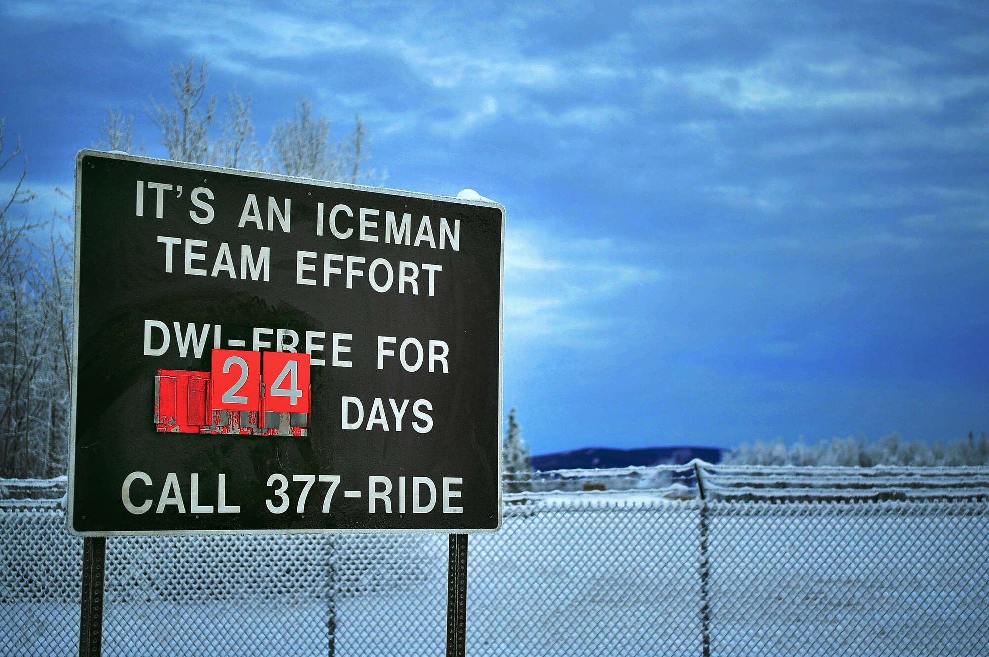 A sign at the Eielson Air Force Base main gate proclaims how many days Eielson residents have gone since the last driving while intoxicated offense. (U.S. Air Force photo/Airman 1st Class Willard E. Grande)