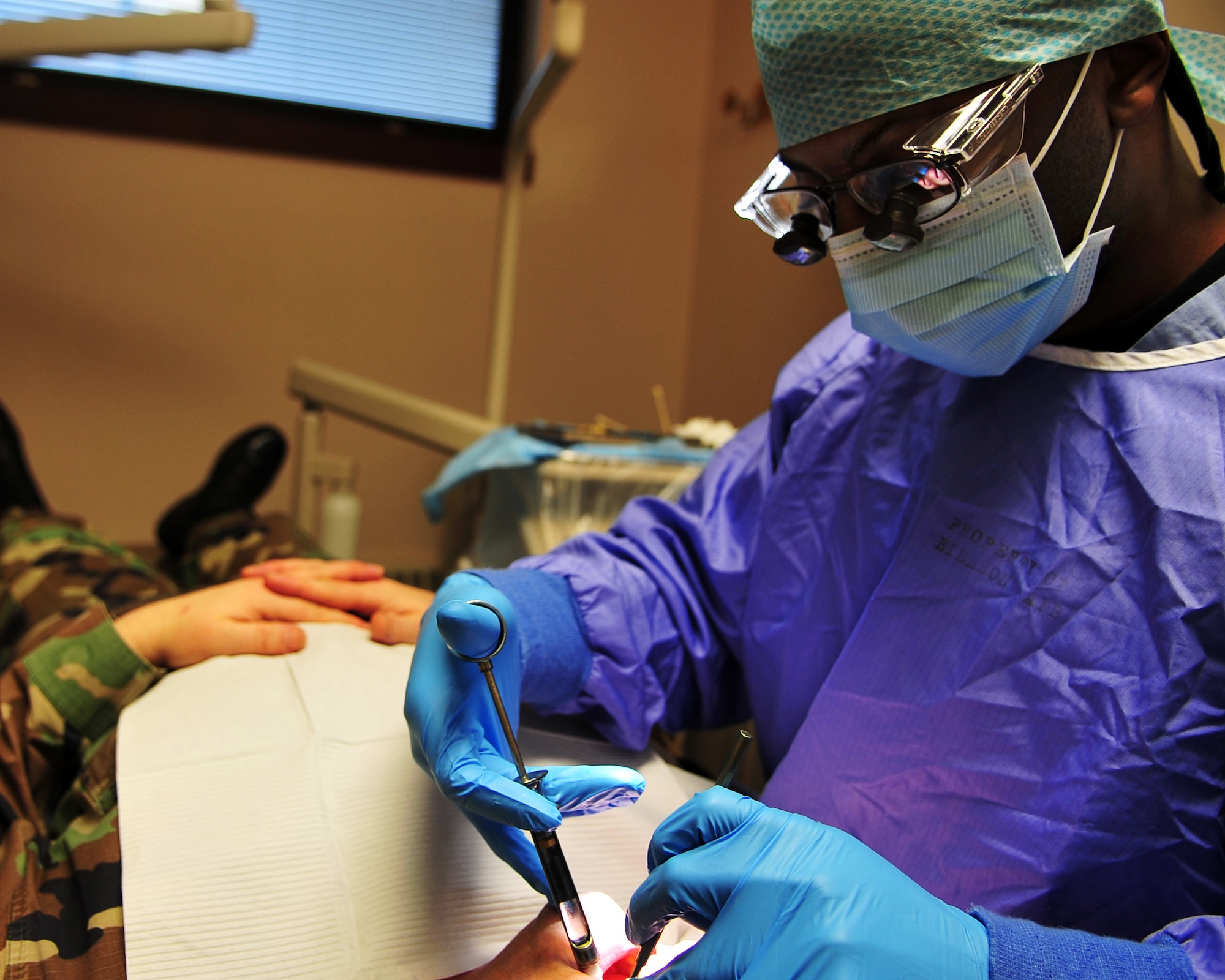 Tech. Sgt. Aaron Gause, 354th Fighter Wing Dental Technician, injects a patient with a local anesthetic during an appointment Jan. 13 at the 354th Medical Group Dental Clinic. Routine dental work will help avoid potentially serious dental issues. (U.S. Air Force photo/Airman 1st Class Willard E. Grande II)