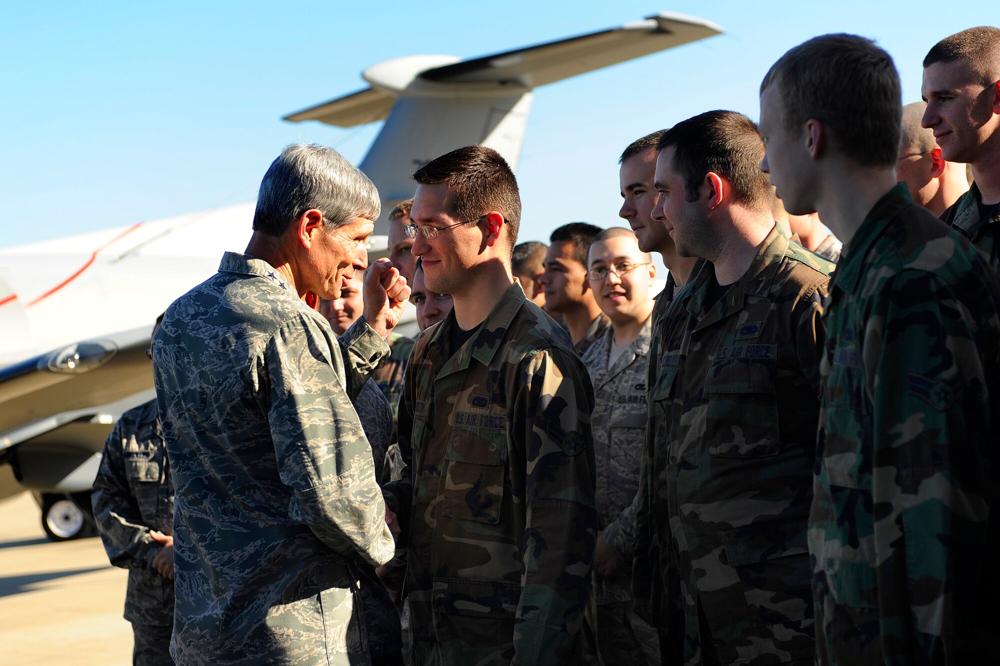 HURLBURT FIELD, Fla. -- Gen. Norton A. Schwartz, Chief of Staff of the U.S. Air Force, Washington, D.C., shakes hands with Airman 1st Class Schuyler Hardesty, 1st Special Operations Aircraft Maintenance Squadron, here, Jan. 9. General Schwartz said a few inspiring words to the Airmen before touring a PC-12 Pilatus. 