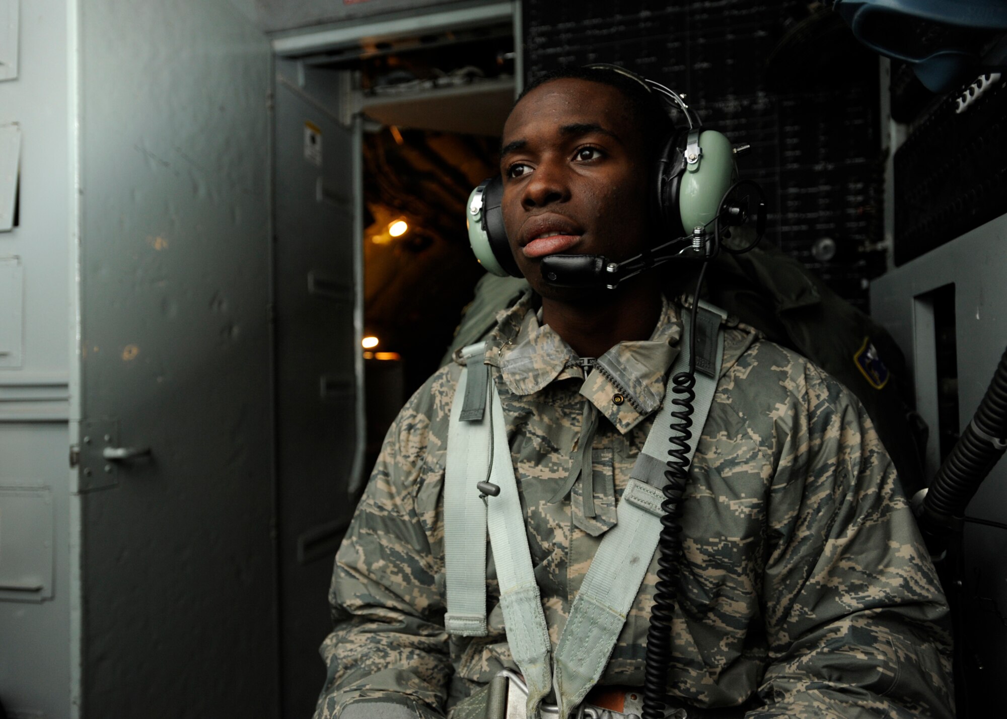 Airman Timothy Lollis sits in the cockpit of a KC-135 Stratotanker just prior to it taking off from McConnell Air Force Base, Kan., on Jan. 10. Airman Lollis, a Philadelphia native, was part of a large group of active-duty Airmen assigned to the 22nd Air Refueling Wing who flew with a crew from the 931st Air Refueling Group during the 931st's January drill weekend. The 931st is an Air Force Reserve unit and the 22nd is its host unit at McConnell Air Force Base, Kan. (U.S. Air Force photo/Tech. Sgt. Jason Schaap)