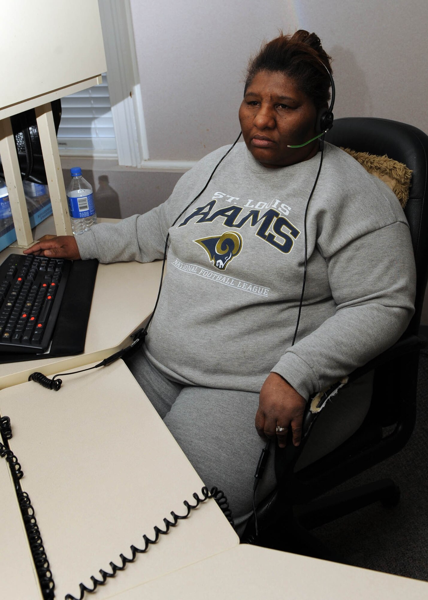 SCOTT AIR FORCE BASE, Ill.-- Lead phone operator Essie Fortner is a seven year veteran of the Scott switchboard. In that time, she has committed the enitre phone directory to memeory to keep servicemembers at Scott connected to the world and the world to Scott. (U.S. Air Force photo/Airman 1st Class Wesley Farnsworth) 