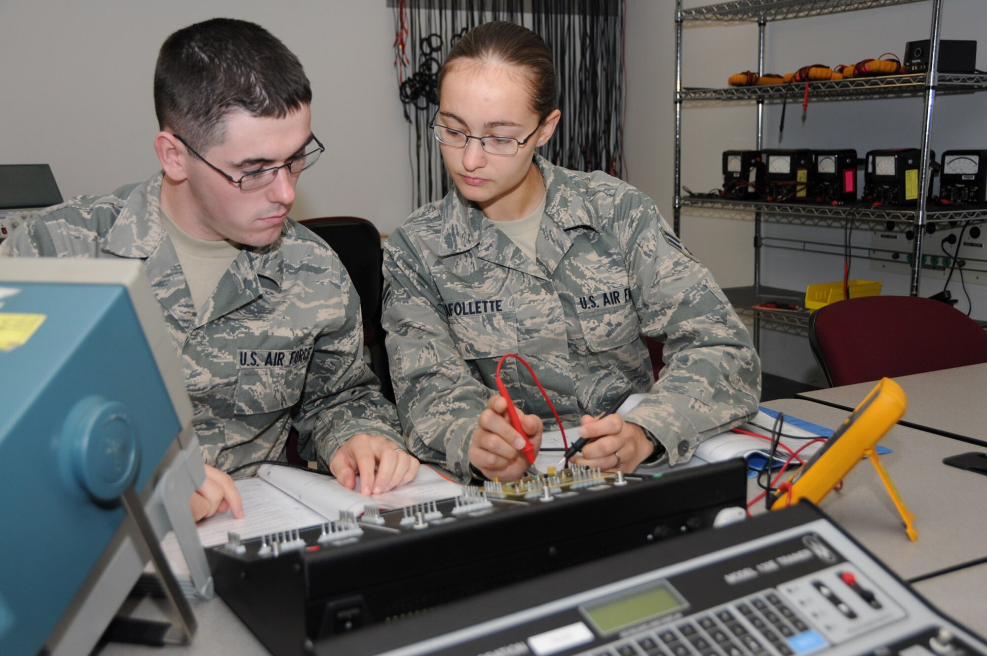 A husband-and-wife team, Airmen 1st Class Steven and Melissa LaFollette, are recent honor graduates of the electronic principles course in the 332nd Training Squadron.  They’re assigned to the 101st Mission Support Flight, Maine National Guard, and remain at Keesler for meteorological navigational training.   In addition to their technical training, Steven is pursuing a law degree at the University of Maine, and Melissa is working on a master’s degree in international relations from American Military Uni-versity.  (U.S. Air Force photo by Kemberly Groue)
