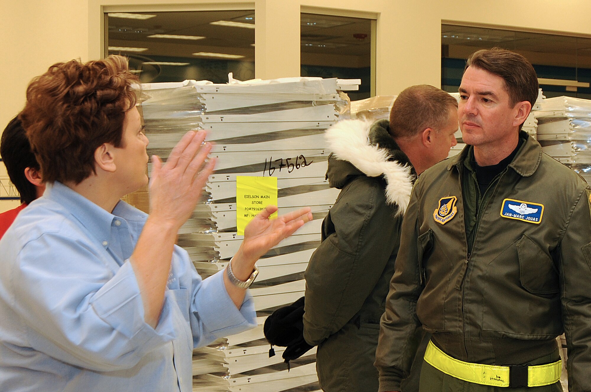Brig. Gen. Jan-Marc Jouas, speaks to Eielson AAFES manager, Anna Van Hoveln and Col. Michael Jordan 354th Fighter Wing Vice Commander, while visiting the new Base Exchange, Eielson Air Force Base, Alaska, Jan. 9, 2009.  Gen. Jouas is the Director of Operations, Plans, Requirements and Programs at Hickam Air Force Base, Hawaii visited Eielson to tour the new chapel, BX and fitness center.  The new 
Base Exchange grand opening is scheduled for Feb. 19.  (U.S Air Force photo/Staff Sgt. Tia Schroeder)       

