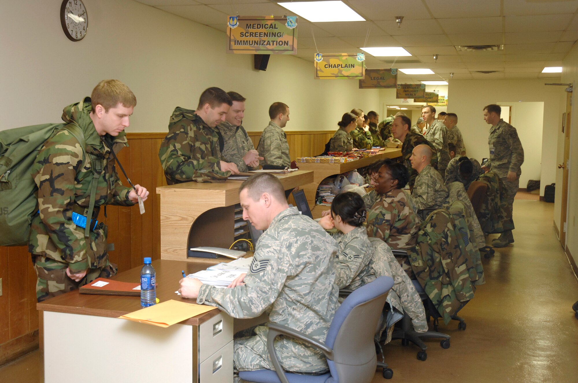 Airmen process at the Wright-Patterson Air Force Base Personnel Deployment Function during a mobility exercise Jan. 13.  The exercise, held Jan. 12-14, simulated mass deployment of 140 Airmen to Kabul, Afghanistan. (U.S. Air Force photo/ Al Bright)