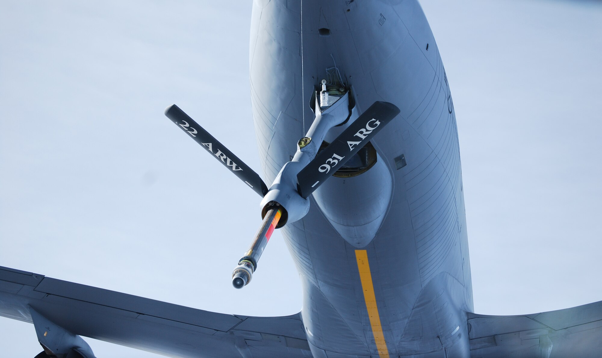 The boom of a KC-135 Stratotanker from McConnell Air Force Base, Kan., is extended to pass fuel to another KC-135 from McConnell during a total-force mission on Dec. 6, 2008. Reserve Airmen from the 931st Air Refueling Group and active-duty Airmen from the 22nd Air Refueling Wing flew the mission together during the 931st's December drill weekend. The 22nd ARW is the 931st's host unit at McConnell. (U.S. Air Force photo/Tech. Sgt. Michael Kissire)