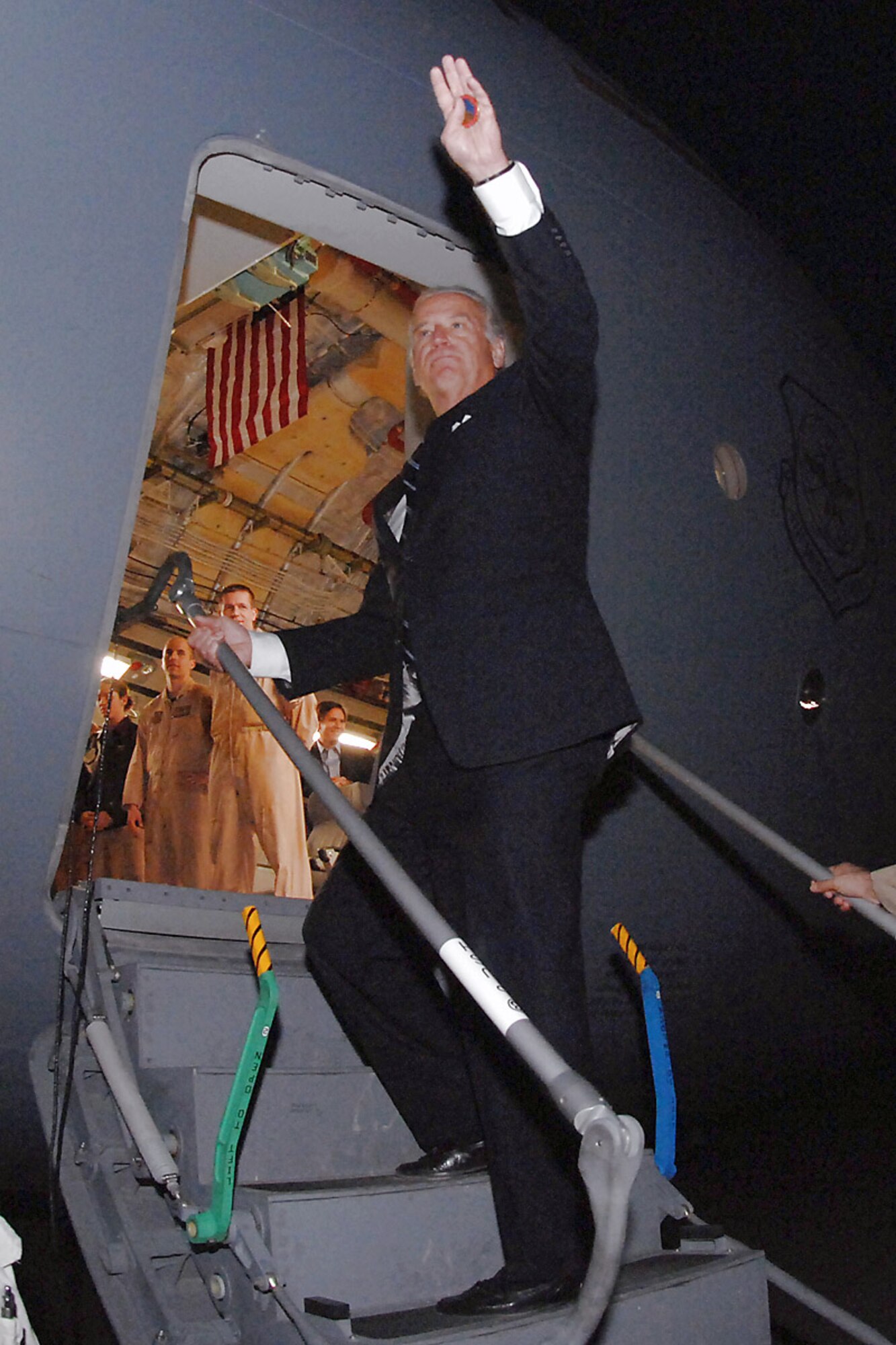Vice president-elect Joe Biden waves goodbye to Soldiers and Airmen after his visit Jan. 13 at Kirkuk Air Base, Iraq. The Delaware senator and Senate Foreign Relations Committee chairman thanked troops for their service before his departure. (U.S. Air Force photo/Senior Airman Eunique Stevens) 
