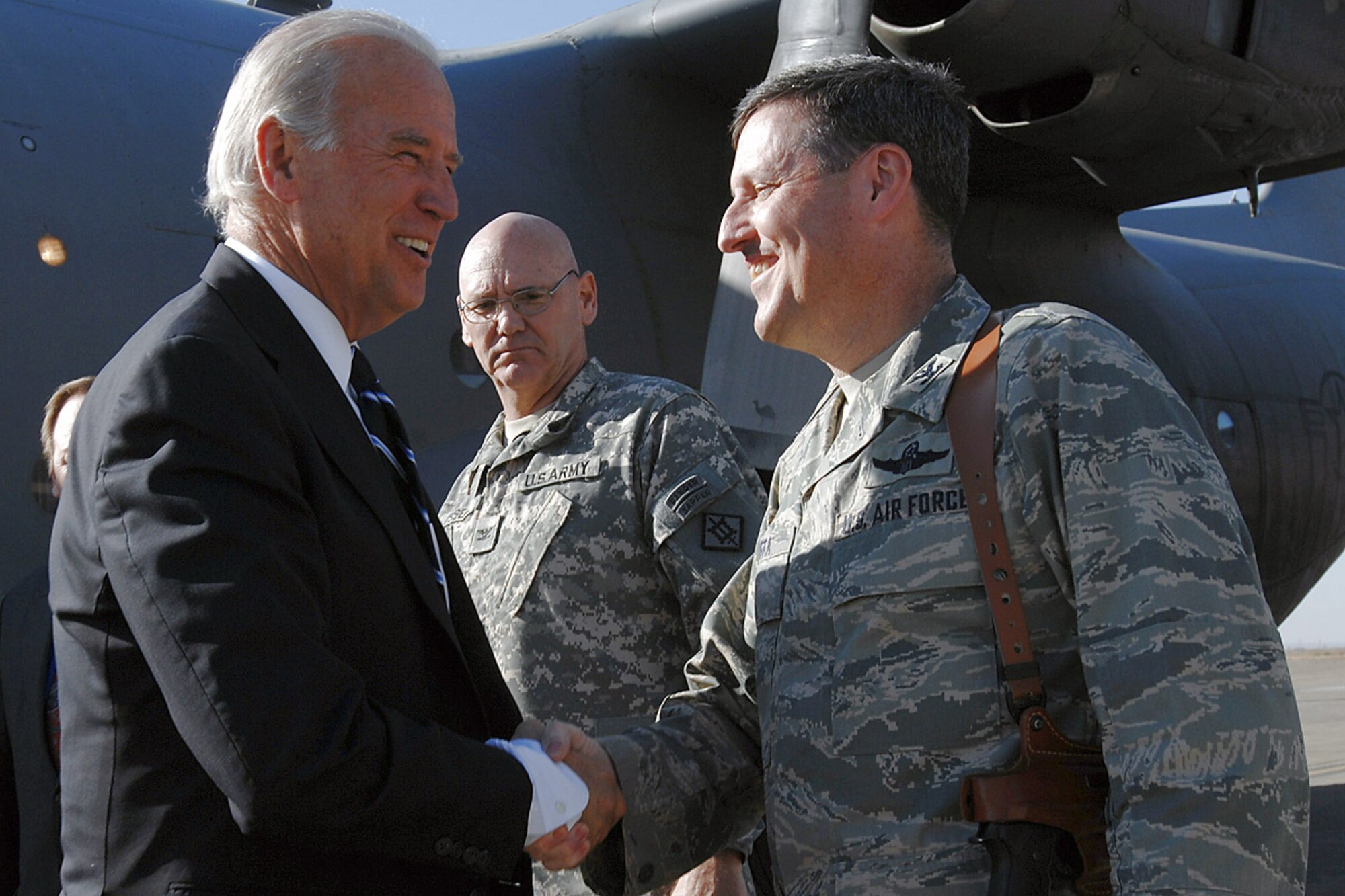 Col. John Costa greets Vice President-elect Joe Biden upon his arrival Jan. 13 to Kirkuk Air Base, Iraq. Colonel Costa, who is deployed here from Maxwell Air Force Base, Ala., was one of several military leaders who welcomed the Delaware senator and Senate Foreign Relations Committee chairman. Colonel Costa is the 506th Air Expeditionary Group commander. (U.S. Air Force photo/Senior Airman Eunique Stevens) 
