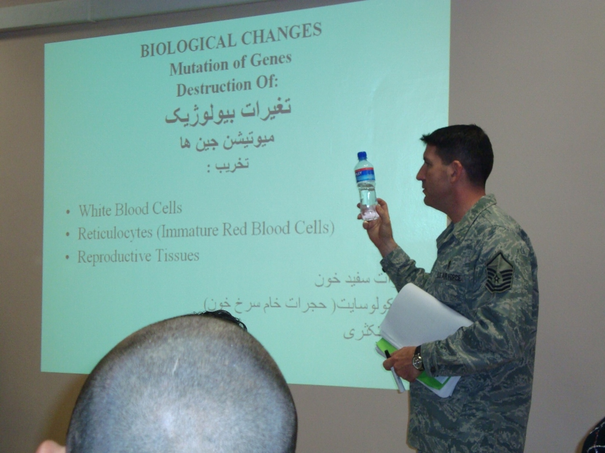 Master Sgt. David Boggs, diagnostic imaging program director for the Allied Health Profession Institute at Camp Eggers, Afghanistan, instructs a class in radiobiology.   Sergeant Boggs, who’s been deployed from the 81st Medical Operations Squadron since December 2007, just completed two blocks of instruction on radiology and is halfway through the third block.  According to Maj. Franklin Espinal, AHPI administrator, “One thing is very apparent — the future of Afghanistan is bright.  All the stereotypes that we’ve heard about Afghans being uneducated were quickly washed away as the students confidently cruised through basic atomic theory, radiobiology, radiation protection, anatomy and physiology and radiologic exposure and positioning while maintaining a 93 percent class average.  The students are motivated and eager to make an impact on their country.”  The 13-member class is a mixture of Afghan National Army and Afghan National Police.  They completed Phase 1 of their training Jan. 8.  Phase 2, which is the meat of the course, starts March 1.  It consists of positioning with a phantom and clinicals at the National Military Hospital and Poly Clinic radiology department.  The class is scheduled to be completed by October.  Sergeant Boggs is expected to return to Keesler next month.  (Courtesy photo)