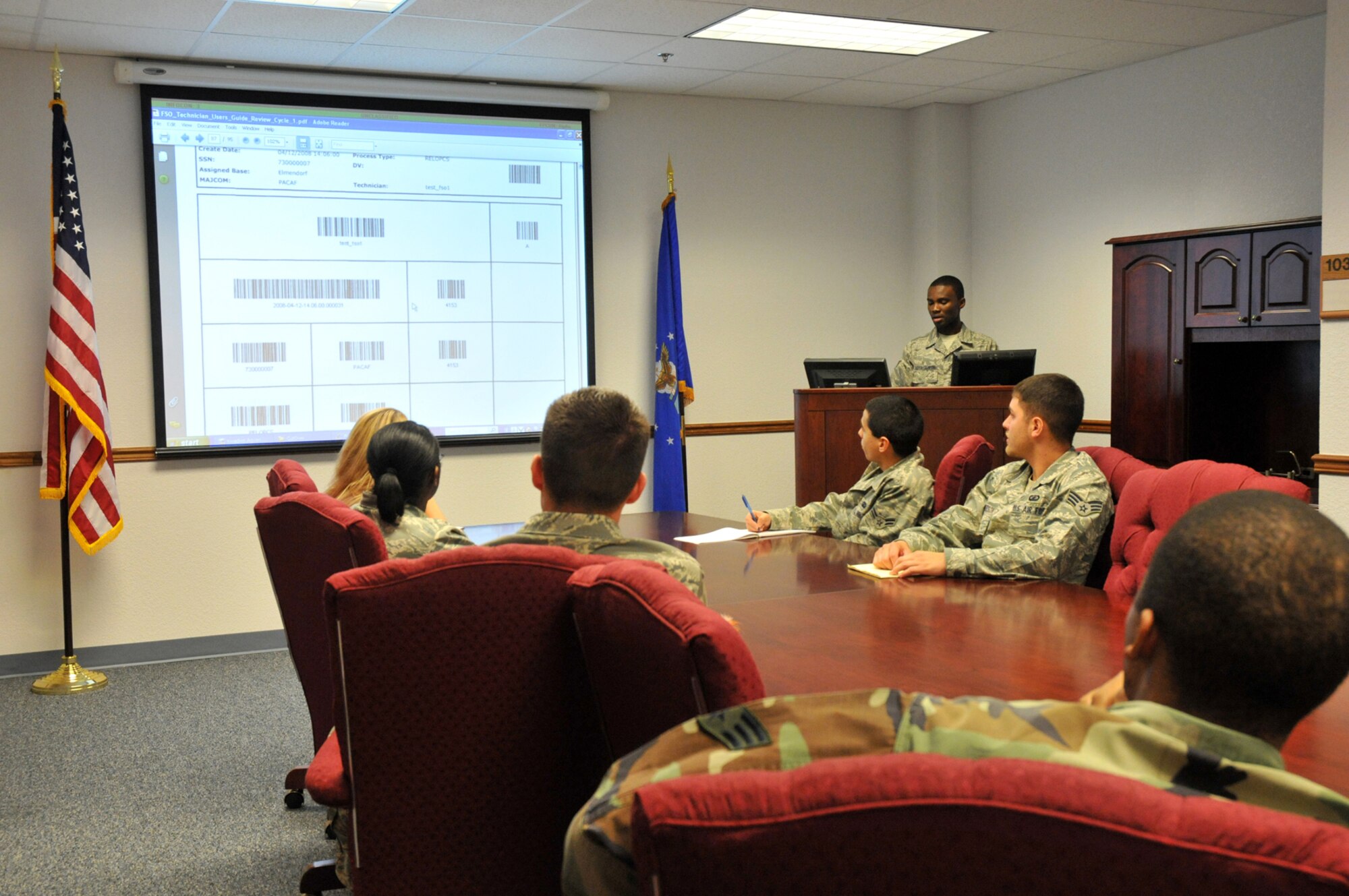 Senior Airman Kwadwo Agyen-Frempong, 81st CPTS, briefs other finance team members during a Jan. 8 training session.  (U.S. Air Force photo by Adam Bond)