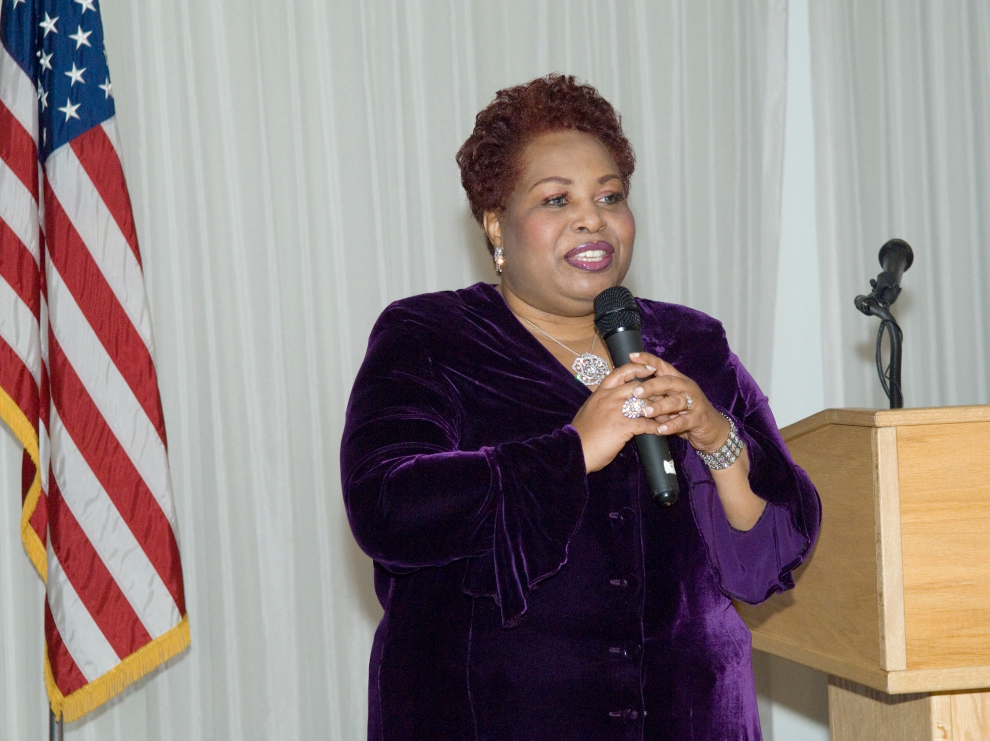 Queen Songbird Esther Martin sings "Touch Somebody's Life" at Hanscom's Martin Luther King Jr. Birthday Observance Breakfast Jan. 13.  (U.S. Air Force photo by Rick Berry)