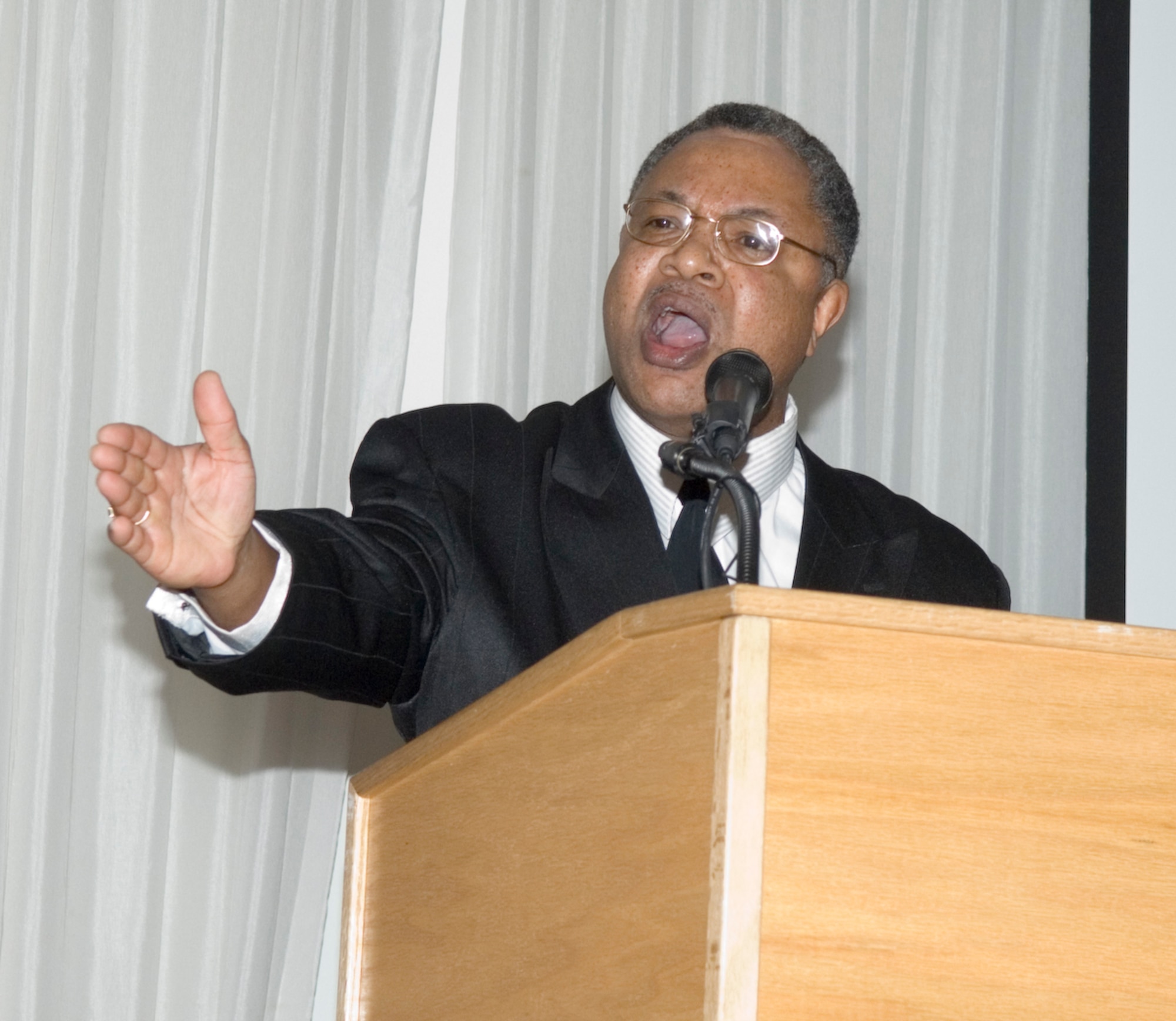 Tim Martin, 66th Security Forces Squadron, reenacts Dr. Martin Luther King Jr.'s "I Have a Dream" speech at the Minuteman Club Jan. 13. The speech was part of an observance breakfast held in honor of Martin Luther King Jr. Day, which will take place Jan. 19.  (U.S. Air Force photo by Rick Berry)