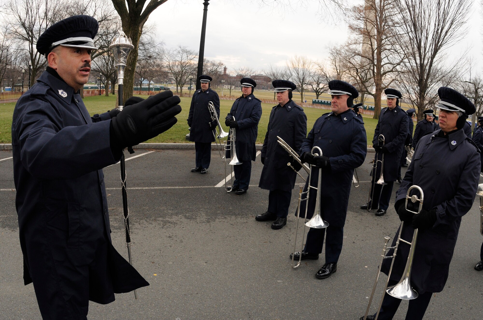 Chief Master Sgt. Edward Teleky explains the spacing needed between elements for the Air Force Band flight before marching down Constitution Avenue during a practice run of the inauguration parade for President-elect Barack Obama Jan. 11 in Washington, D.C. Chief Teleky is the drum major and director of the Air Force Band's Ceremonial Brass. (U.S. Air Force photo/Staff Sgt. Dan DeCook) 
