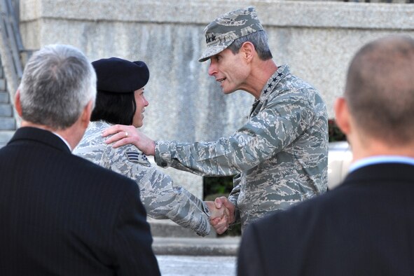 EGLIN AIR FORCE BASE, Fla. -- Air Force Chief of Staff Gen. Norton Schwartz presents a Commander's Coin to Senior Airman Ashley Tubbs, named the 2008 Security Forces Airman of the Year, during his visit to Eglin Jan. 9. (U.S. Air Force photo/ Airman Anthony Jennings)