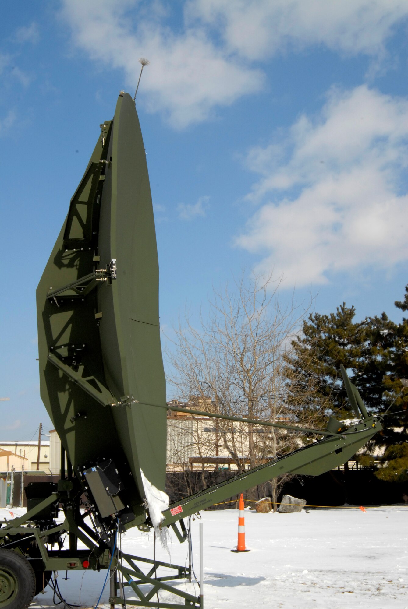 The Large Aperture Multiband Deployable Antenna, deployed to Kunsan Air Base, Republic of Korea in response to the Peninsula Wide Operation Readiness Exercise, receives signals to help boost the 8th Communication Squadrons capabilities, Jan. 14, 2009. The LAMDA, along with the Airmen that run it, are assigned to the 607th Air and Space Communications Squadron out of Osan Air Base, Republic of Korea.  (U.S. Air Force Photo by SSgt Jason Colbert)