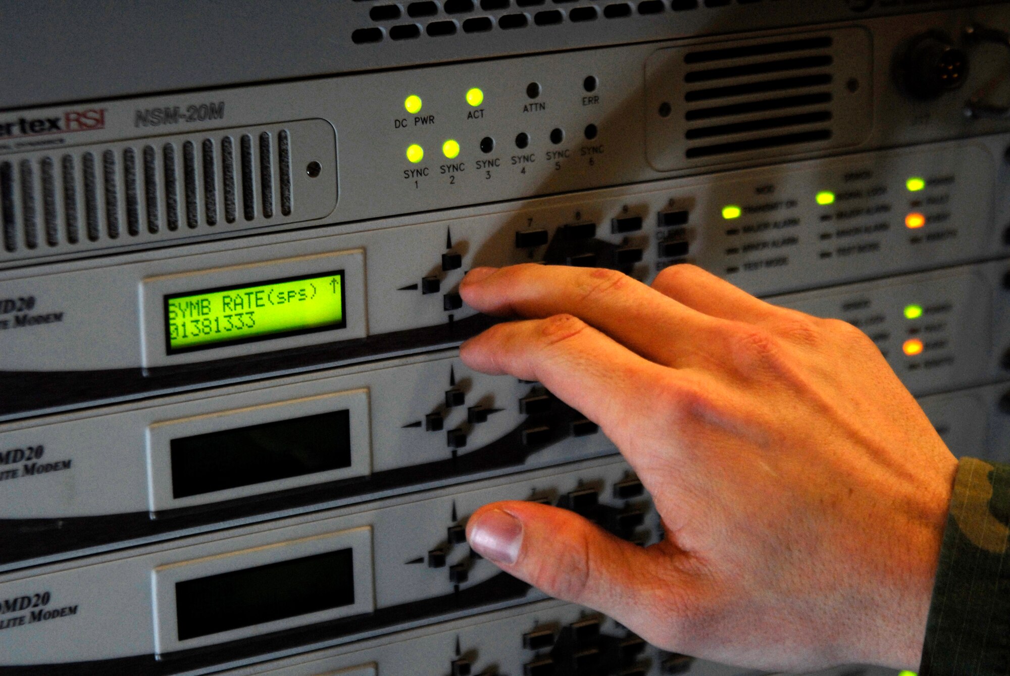 Airman 1st Class Nicholas Bernek programs a satellit modem during the Peninsula Wide Operation Readiness Exercise at Kunsan Air Base, Republic of Korea, Jan. 14, 2009. Airman Bernek is assigned to the 607th Air and Space Communications Squadron out of Osan Air Base, Republic of Korea. (U.S. Air Force Photo by SSgt Jason Colbert)