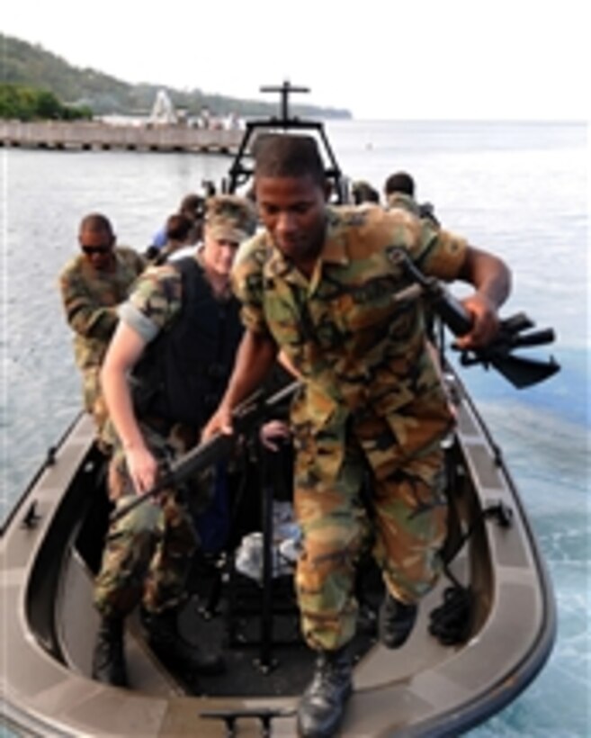 U.S. Navy sailors from Expeditionary Training Command and members of the Jamaica Defense Force conduct a small boat exercise during a Southern Partnership Station training course in Port Antonio, Jamaica, on Jan. 8, 2009.  Southern Partnership Station is a training mission to Central America, South America and the Caribbean Basin.  