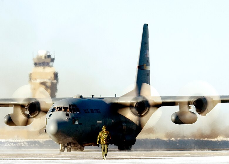 A  C-130 Hercules from the 133rd Airlift Wing, Minnesota Air National Guard, taxis down the runway at the Minneapolis St. Paul International Airport January 14, 2009.  The aircraft carried the last 29 members of the wing home after being deployed to Bagram Air Field, Afghanistan. This return marks the end of the aviation support to the Operation Enduring Freedom rotation by the 133rd Airlift Wing for this cycle. The C-130s provide intra-theater heavy airlift, delivering tons of cargo and transporting passengers in support of Operation Enduring Freedom.
(U.S. Air Force photo/Tech. Sgt. Erik Gudmundson) 
