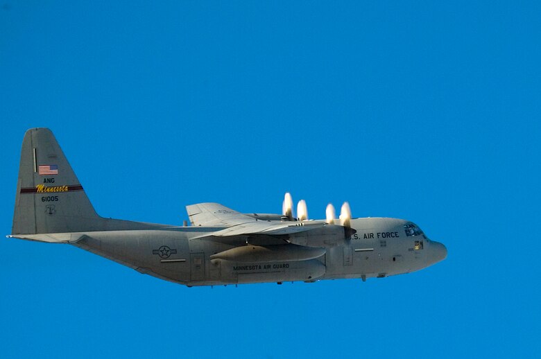 A  C-130 Hercules from the 133rd Airlift Wing, Minnesota Air National Guard, flies by in the clear cold sky over the Minneapolis St. Paul International Airport January 14, 2009.  The aircraft carries the last 29 members of the wing home after being deployed to Bagram Air Field, Afghanistan. The C-130s provide intra-theater heavy airlift, delivering tons of cargo and transporting passengers in support of Operation Enduring Freedom.
(U.S. Air Force photo/Tech. Sgt. Erik Gudmundson) 