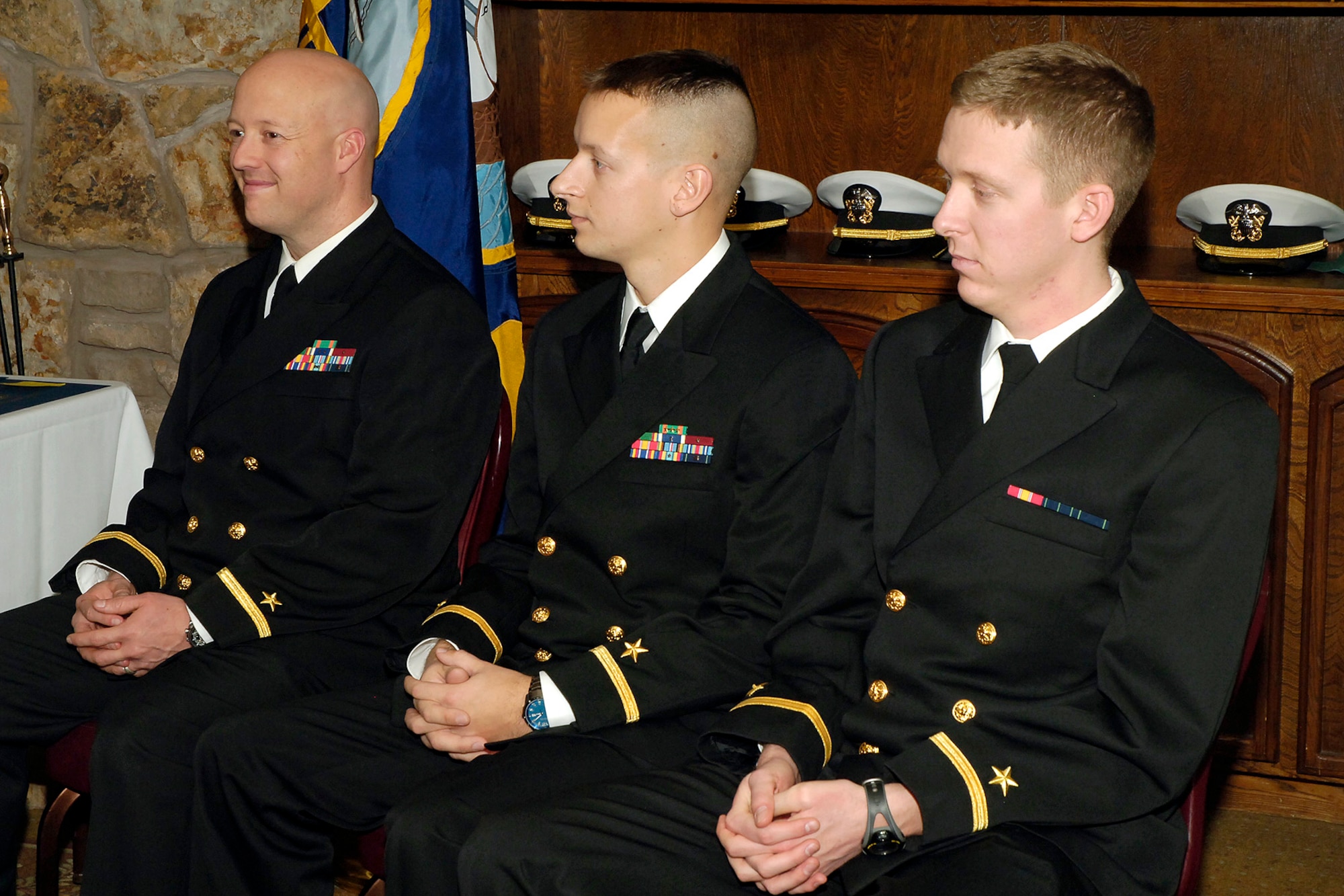 Naval Flight Officer Class N08-03 officially received their flight officer status and gold NFO wings at a recent ceremony held at the Tinker Club. The Navy’s newest Aviators, from left, are Ensign Joseph Ballard, Ensign Bradley J. La Fontaine and Ensign Colin Raunig. (Navy photo)