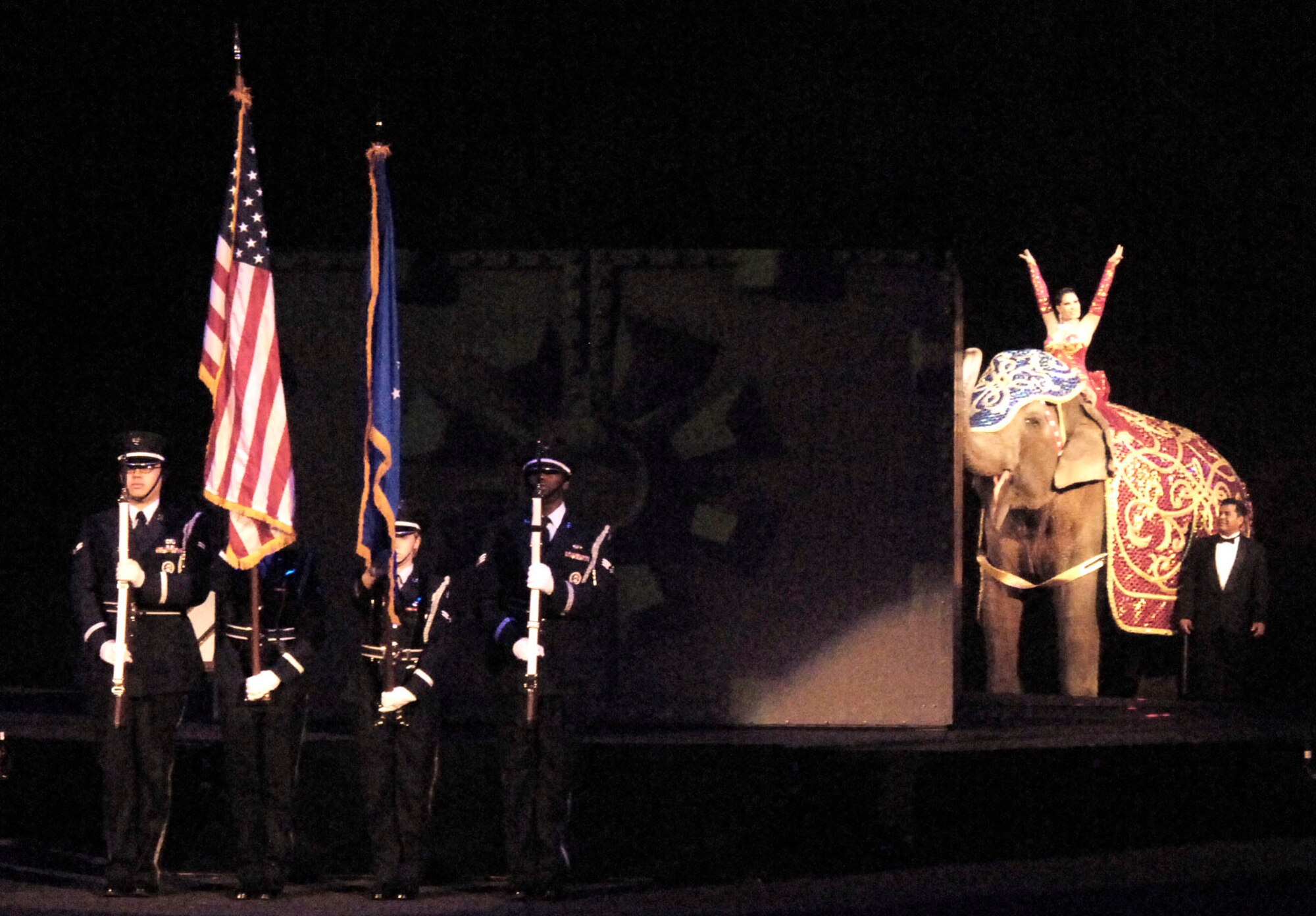Members of the MacDill Honor Guard present the colors during the Ringling Bros. and Barnum & Bailey’s opening show at the St. Pete Times Forum in Tampa, Jan. 9. Along with presenting the colors, another member of the Honor Guard was recognized for his dedication to the Honor Guard. Airman Samuel Blair, 6th Maintenance Squadron, was recognized for stepping up and performing 13 details in his first month as Honor Guard. 