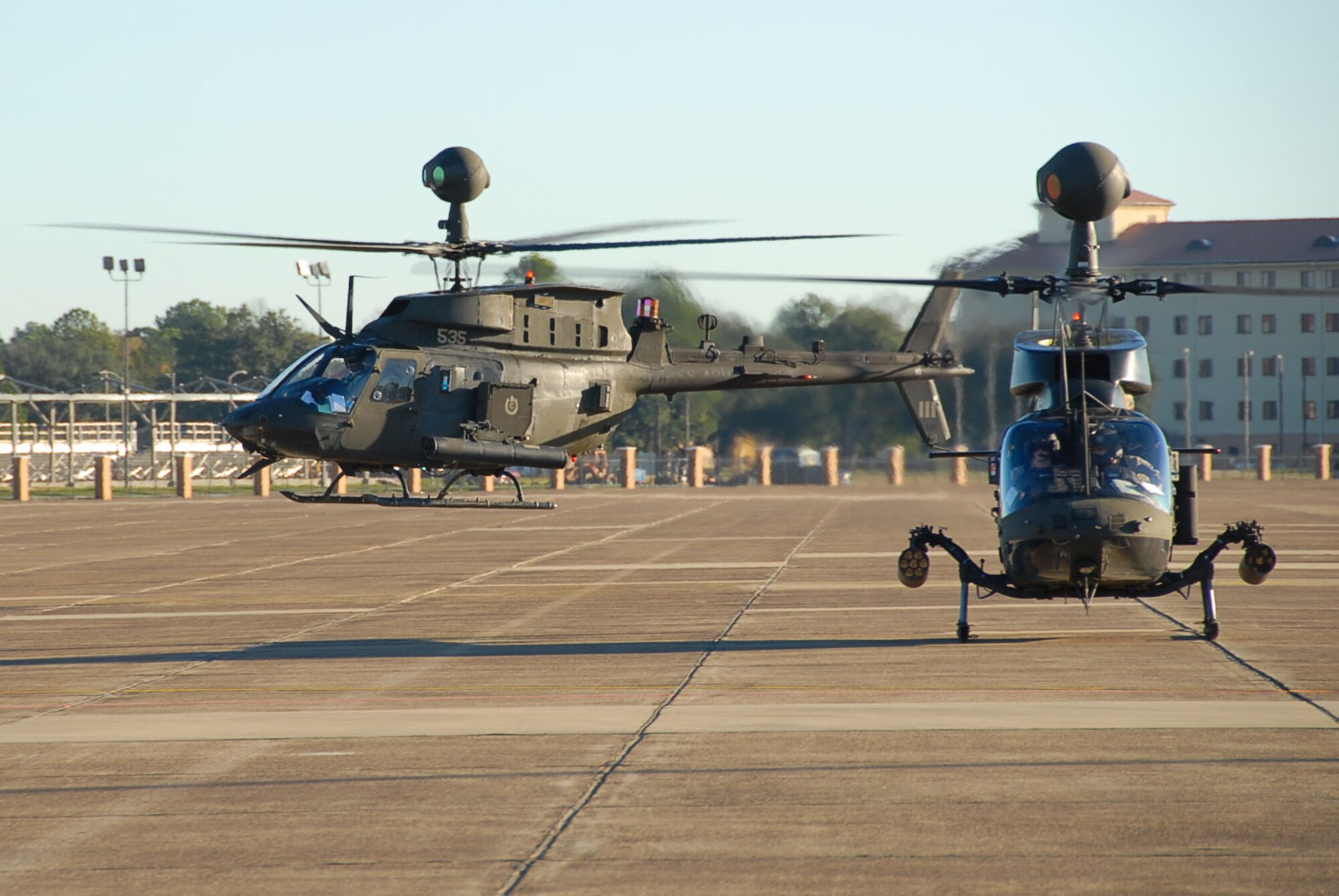 Two of more than 20 Army helicopters prepare to leave the Maxwell flight line after an overnight stay at the base Jan. 9. The aircraft were en route from Fort Bragg, N.C., to the Army’s Joint Readiness Training Center at Fort Polk, La. Maxwell Air Force Base is used on a regular basis by aircrews not assigned to the base for a variety of purposes to include re-fueling and lodging. (Air Force photo by Jamie Pitcher)