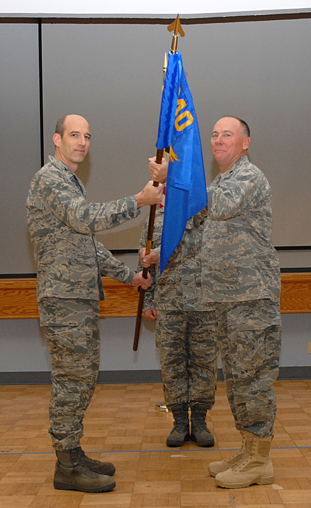 BEALE AIR FORCE BASE, Calif. -- 940th Air Refueling Wing commander, Air Force Reservist Col. Jeffrey "Sal" Mineo presents the 940th Mission Support Group flag to the new 940th MSG commander, Air Force Reservist, Lt. Col. Kenneth Baker during the 940th MSG Assumption of Command ceremony here, Jan. 11, 2009.
(U.S. Air Force Photo/ Tech. Sgt. Luke Johnson)