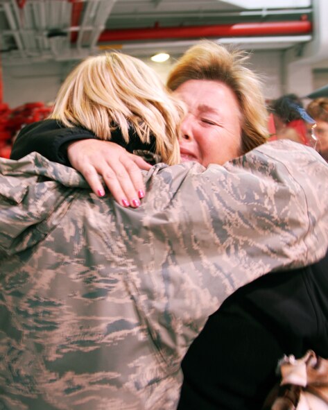 Approximately 140 180th Fighter Wing personnel return home
from an Air Expeditionary Forces rotation to Balad Air Base December 12, 2008.
The members were greeted by about 300 family members and well-wishers who
waited patiently in the hangar to be reunited with their loved ones who had been
on this deployment since October, 2008.

USAF Photo by Airman First Class Amber Williams