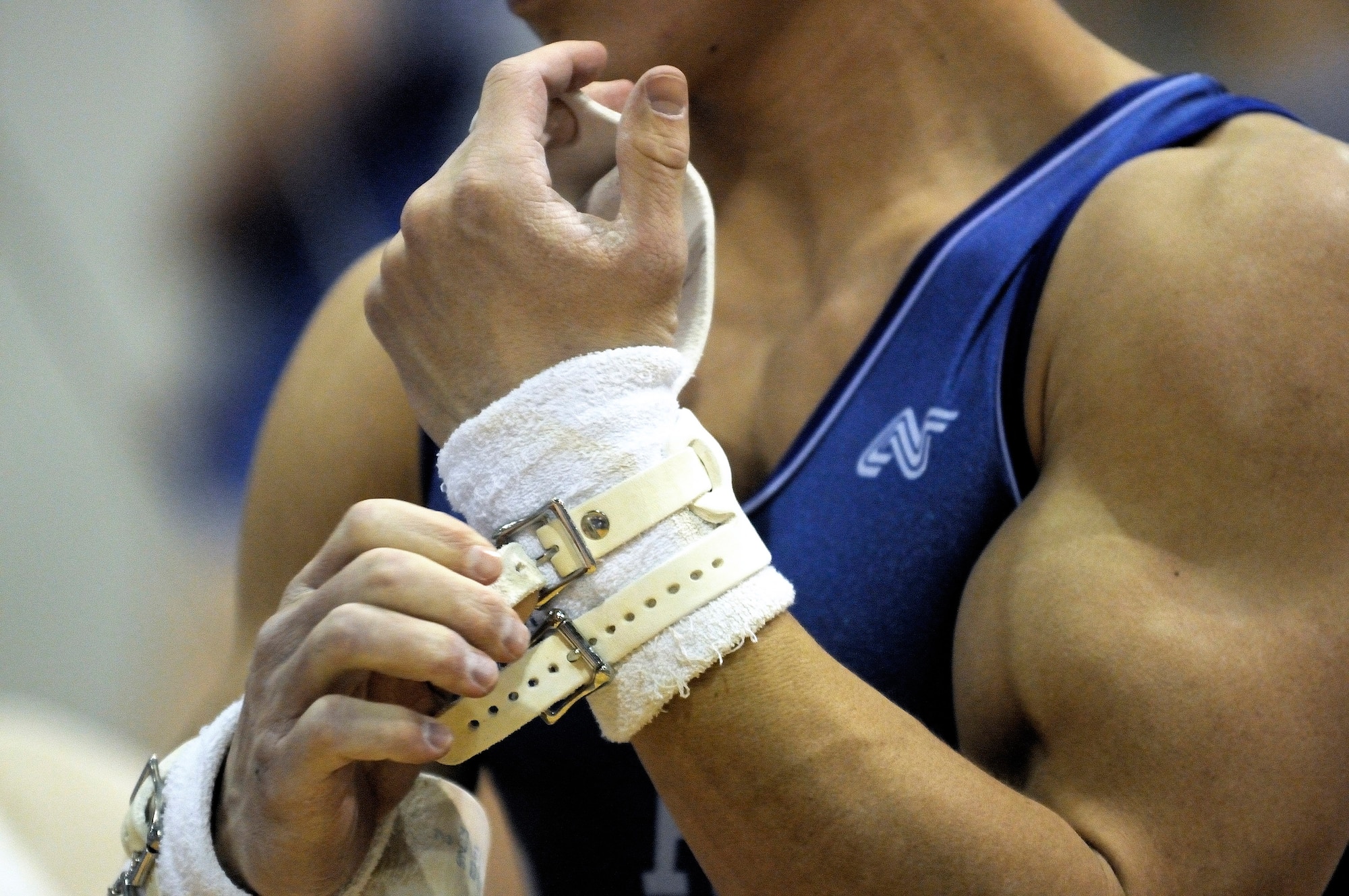 U.S. Air Force Academy senior Josiah Loese prepares himself for the still ring competition during the annual Rocky Mountain Open Jan. 10 at the Academy in Colorado. The Falcons men's gymnastics team accounted for seven top-10 finishes as they placed third overall in the meet in front of a capacity crowd. (U.S. Air Force photo/Mike Kaplan)
