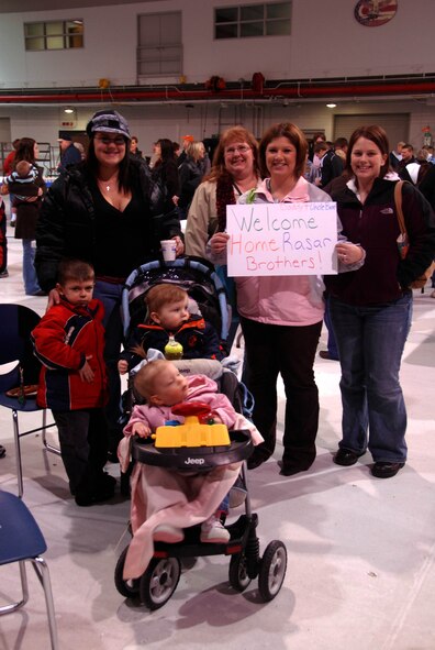 Approximately 140 180th Fighter Wing personnel return home
from an Air Expeditionary Forces rotation to Balad Air Base December 12, 2008.
The members were greeted by about 300 family members and well-wishers who
waited patiently in the hangar to be reunited with their loved ones who had been
on this deployment since October, 2008.

USAF Photo by Senior Airman Jodi Leininger