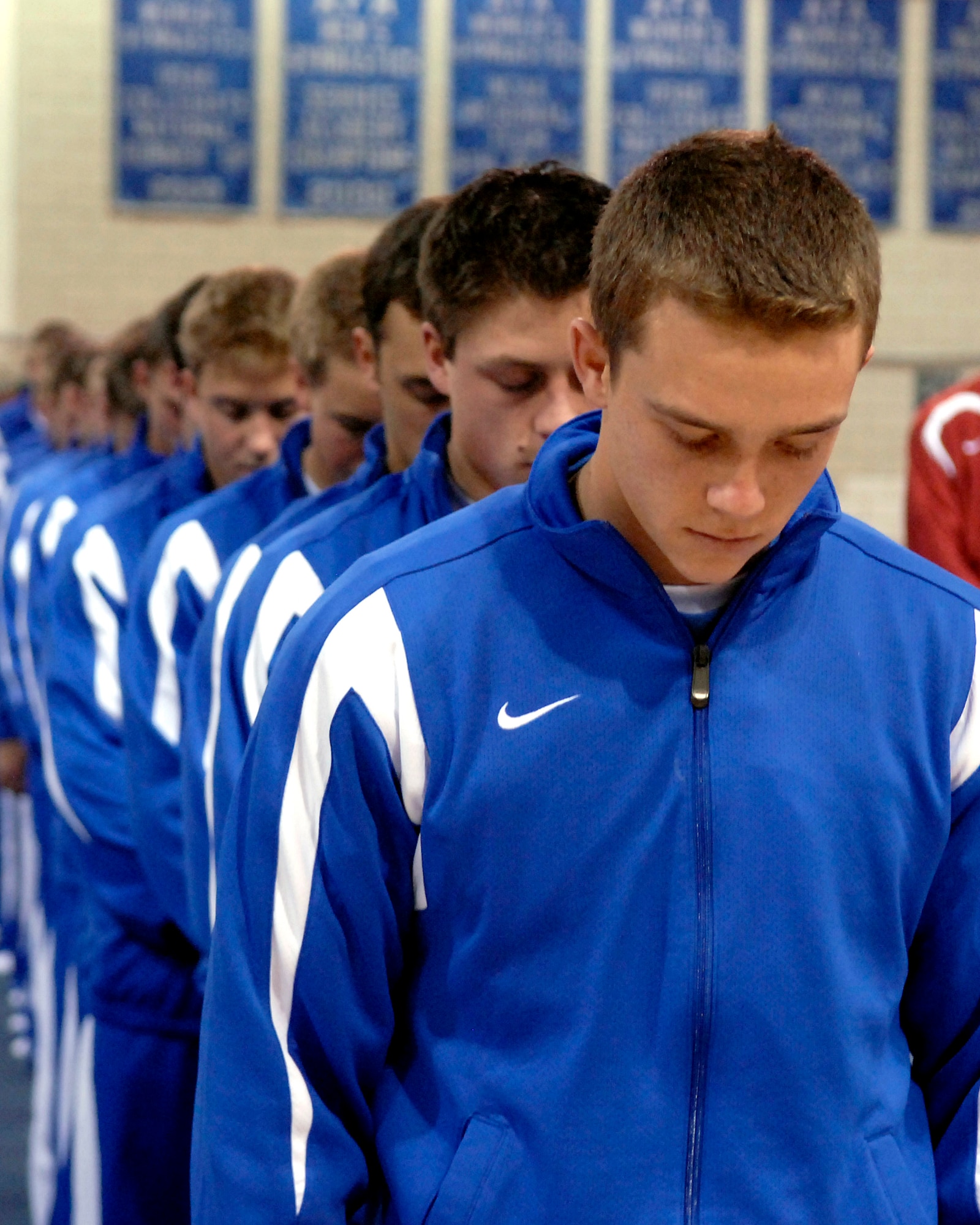 U.S. Air Force Academy senior Jake Schonig leads the Academy men's gymnastics team in a moment of silence honoring Capt. Levi Torkelson, an assistant coach who died in a car accident Dec. 27, 2008, Jan. 10 at the Academy in Colorado. Schonig is the team captain. (U.S. Air Force photo/Mike Kaplan)

