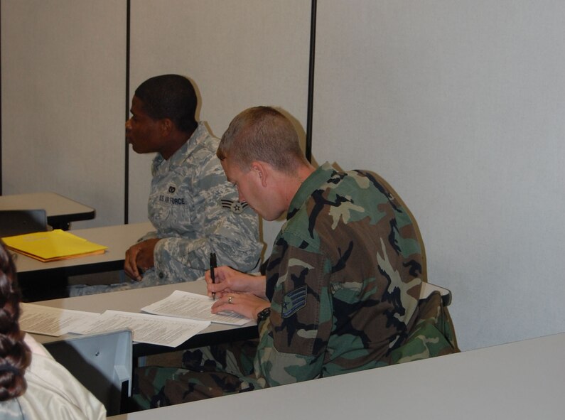 Staff Sgt. Brandt Riley, an engineering draftsman with the 341st Civil Engineer Squadron, fills out required paperwork during his in-processing briefing Jan. 8. He was one of 25 341st CES members returning from a six-month deploymnet to Iraq. (U.S. Air Force photo/Valerie Mullett)