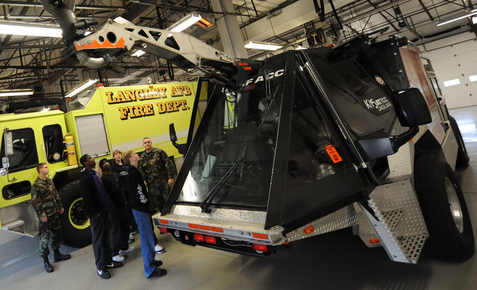 LANGLEY AIR FORCE BASE, Va. -- Students from Gildersleeve Middle School and Menchville High School check out the "Jaguar" at the Langley Fire Department during a tour of Langley Jan. 13. The students are part of a youth program that emphasizes workplace readiness training, college preparation, and career exploration. (U.S. Air Force photo/Airman Rebecca Montez)