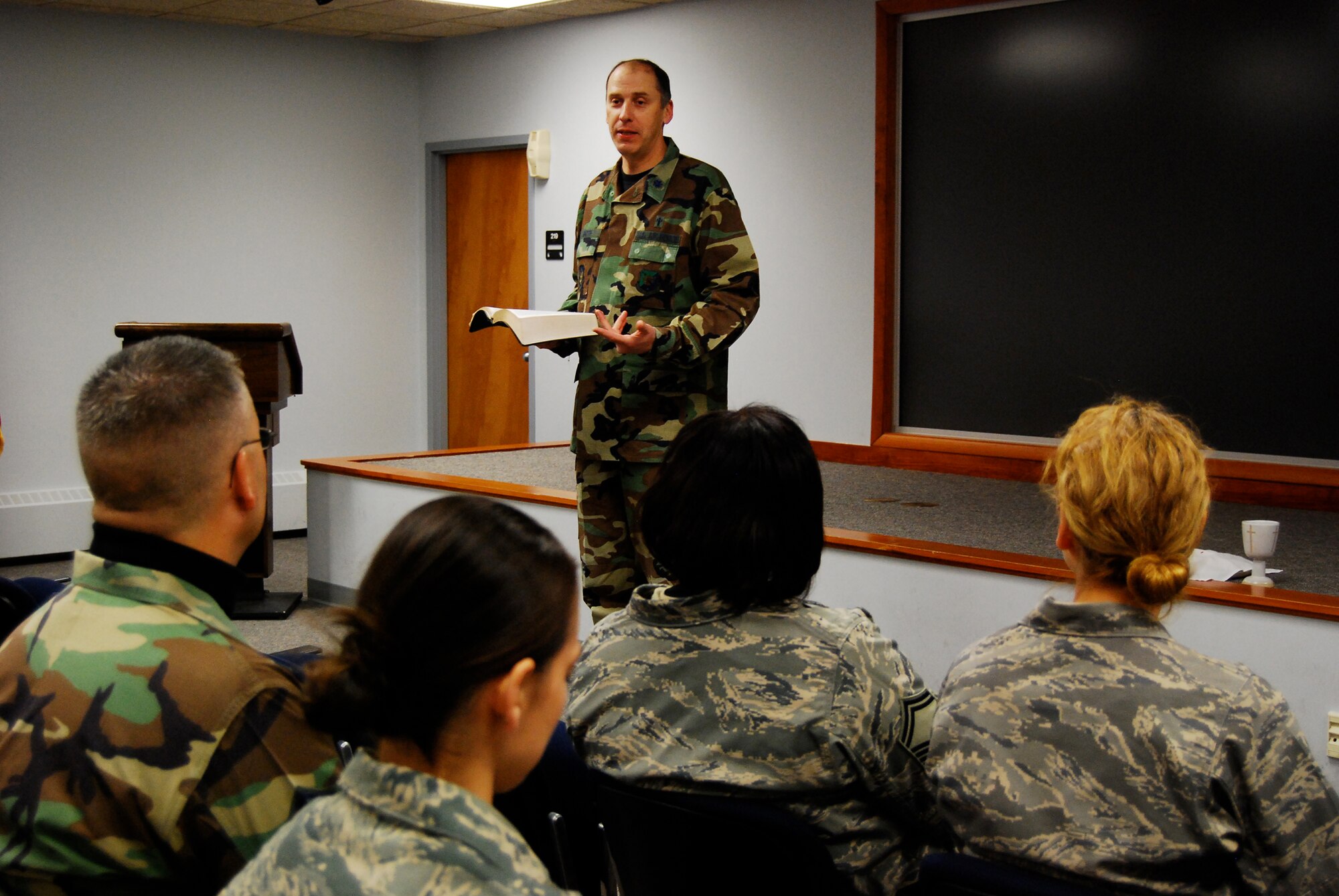 DOVER AIR FORCE BASE, Del. -- 512th Airlift Wing Chaplain (Lt. Col.) John Groth gives his final sermon as a Reservist at a chapel service during the January 2009 Unit Training Assembly.  Chaplain Groth is retiring from the Air Force Reserve and his ceremony is during the February Unit Training Assembly. Chaplain (Capt.) Barry Ball is the new wing chaplain. (U.S. Air Force photo/Staff Sgt. Steve Lewis) 