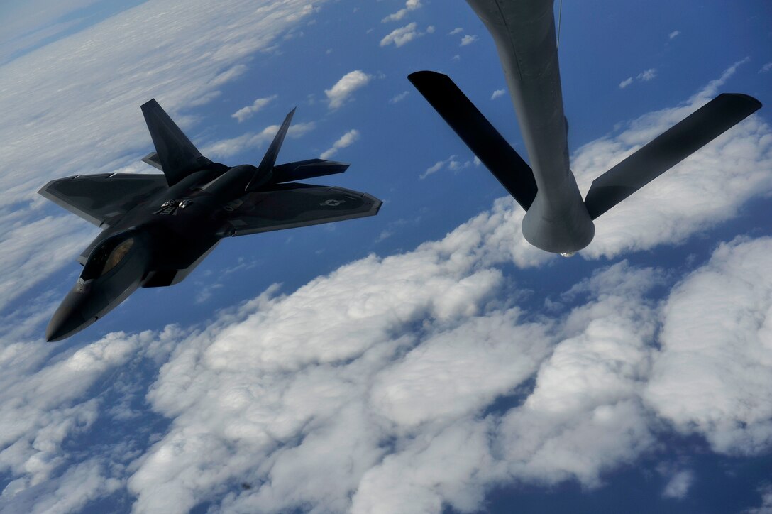 An F-22A Raptor awaits to refuel from a KC-135 Stratotanker on Jan. 15. The F-22A is deployed to Kadena Air Base, Japan from the 27th Fighter Squadron Langley Air Force Base, Va. in support of U.S. Pacific Command.
(U.S. Air Force photo/Senior Airman Clay Lancaster)