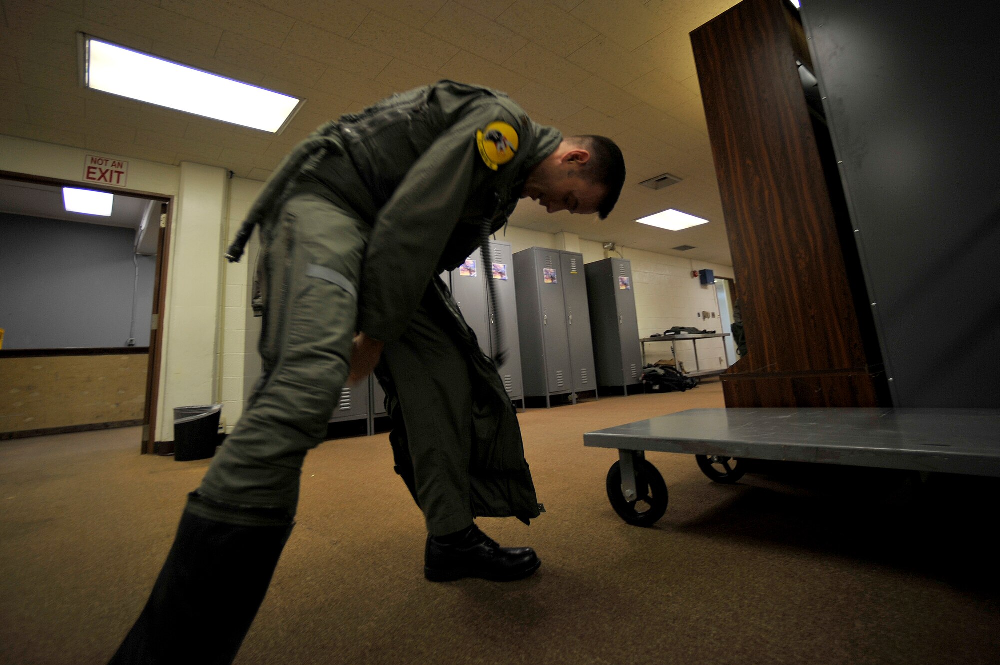 Maj. Jeff Rock, F-22 Raptor pilot, suits up before a flight at Kadena Air Base, Japan, Jan. 14. The F-22's are deployed from the 27th Fighter Squadron Langley Air Force Base, Va. in support of U.S. Pacific Command. (U.S. Air Force photo/Senior Airman Clay Lancaster)